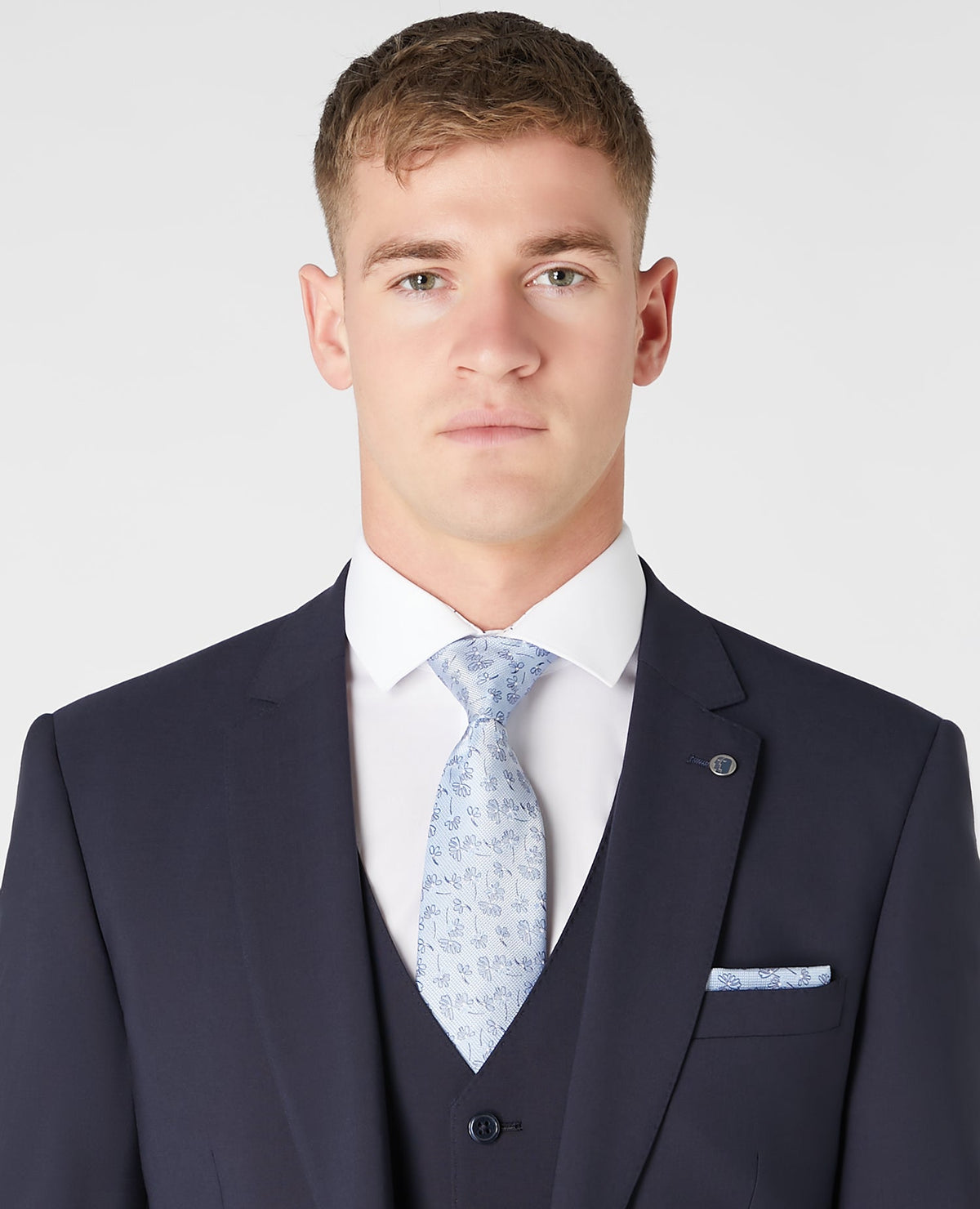 Man wearing a blue Silk Floral Tie