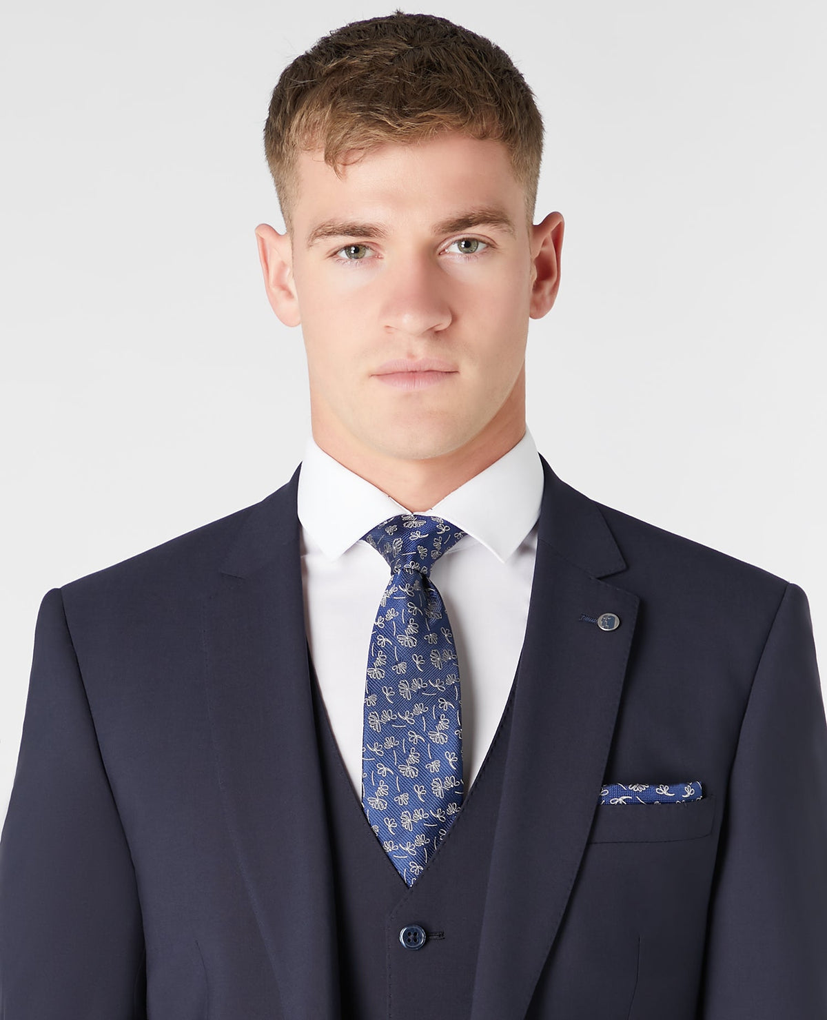 Man wearing a navy Silk Floral Tie