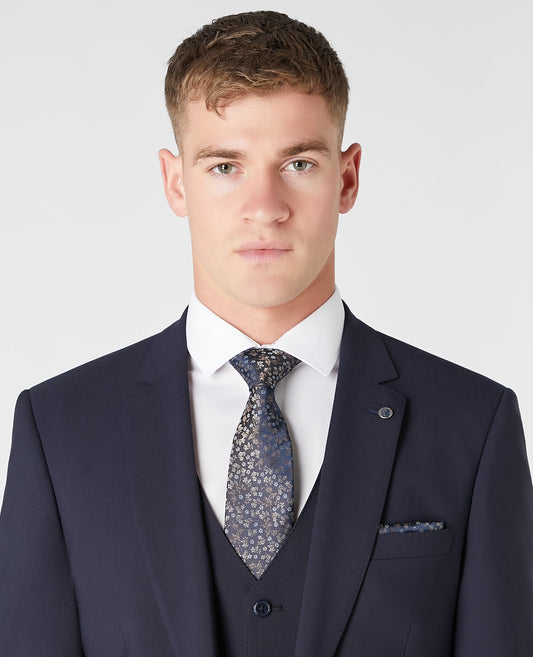 Man wearing a navy Silk Floral Tie