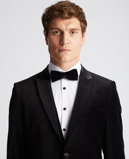 Man wearing a black Velvet Bow Tie