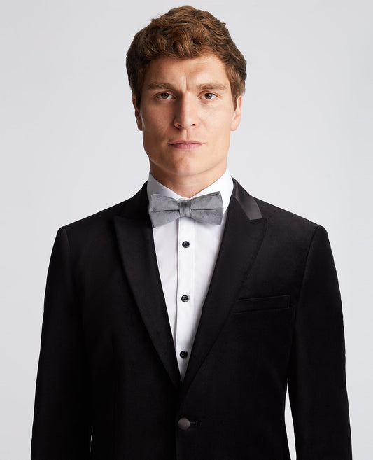 Man wearing a grey Velvet Bow Tie