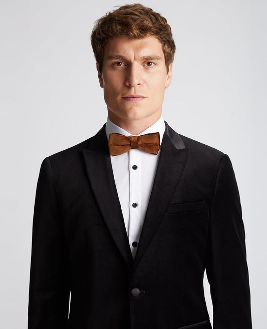 Man wearing a orange Velvet Bow Tie