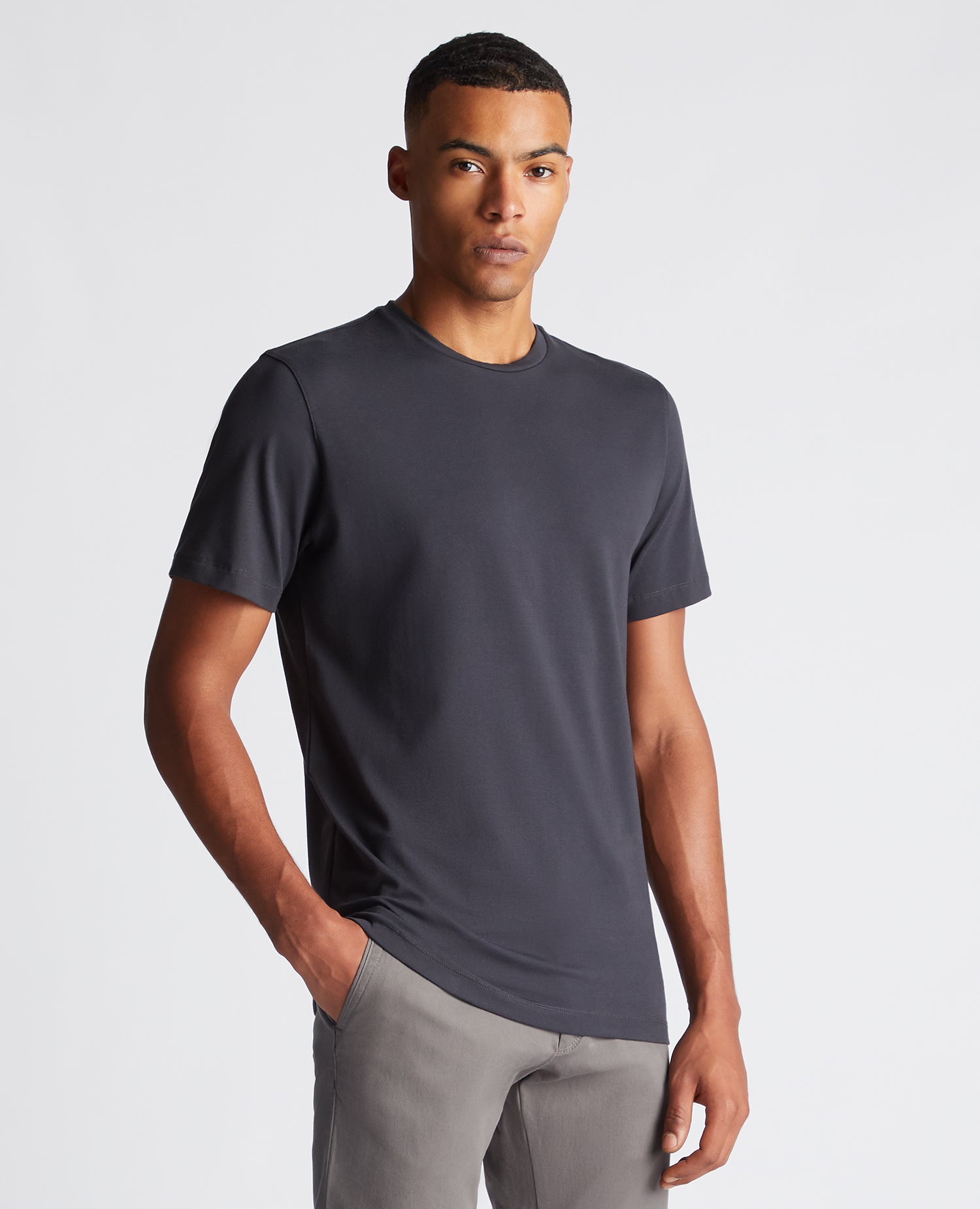 Man wearing a grey Tapered Fit Cotton-Stretch T-Shirt