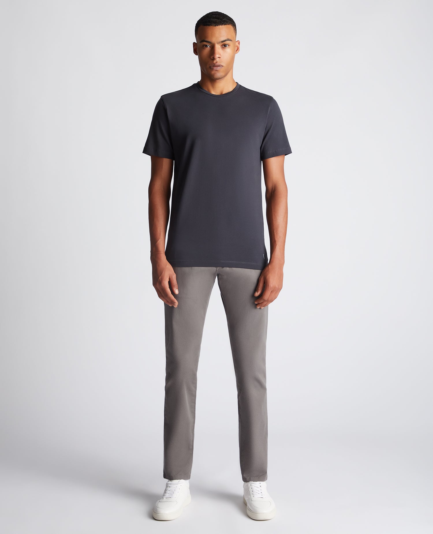 Man wearing a grey Tapered Fit Cotton-Stretch T-Shirt