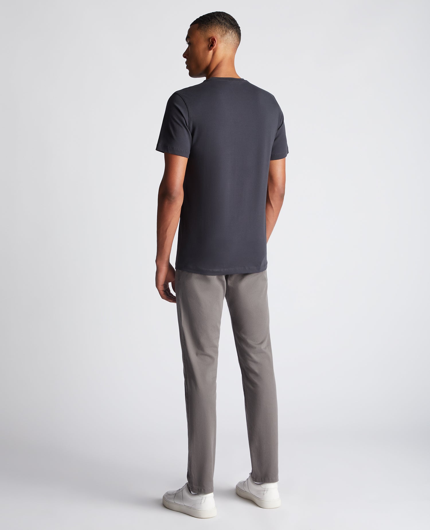 Man wearing a grey Tapered Fit Cotton-Stretch T-Shirt