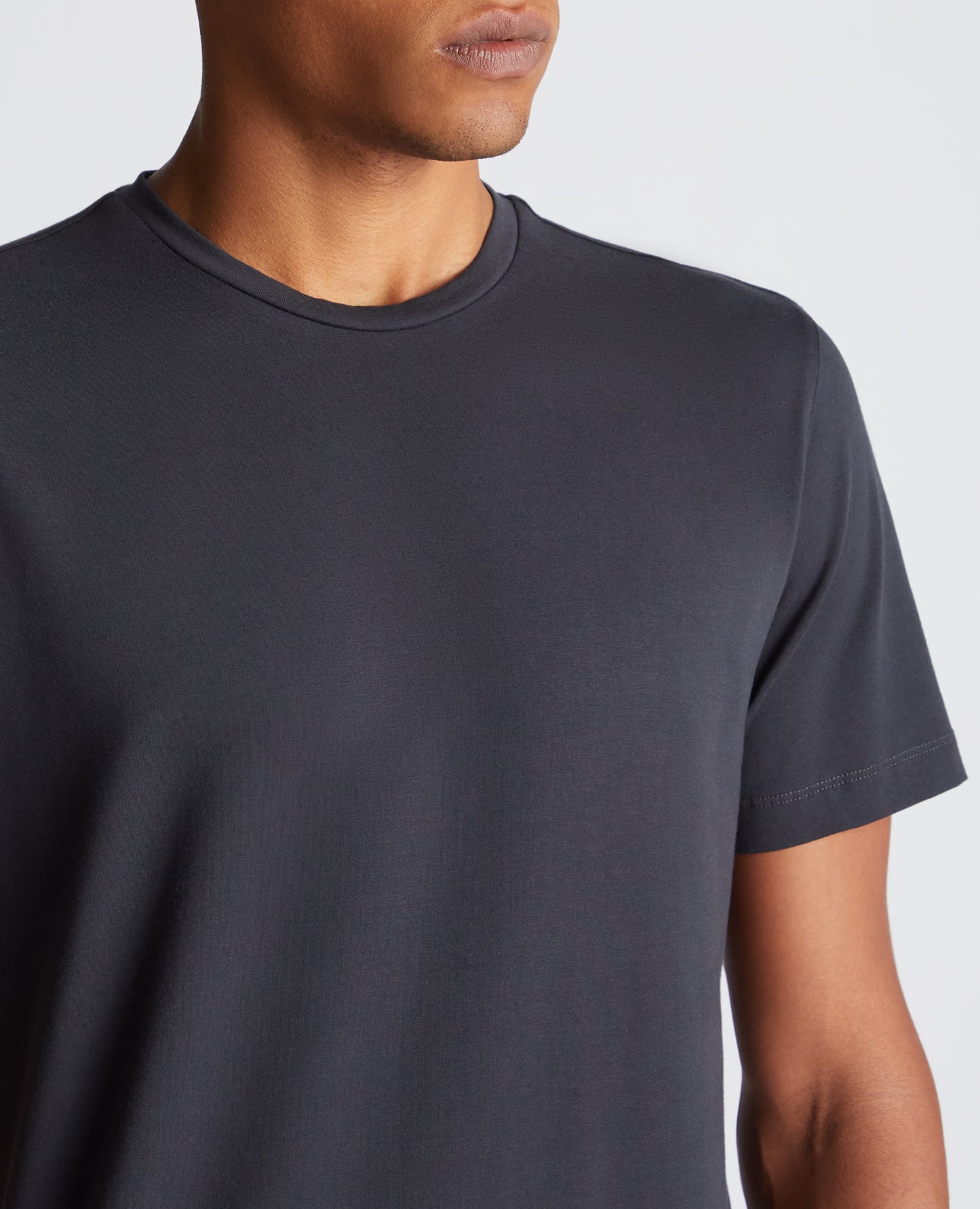 Man wearing a grey Tapered Fit Cotton-Stretch T-Shirt