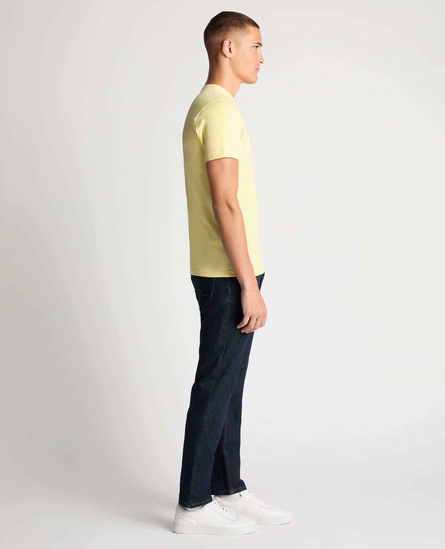 Man wearing a orange Tapered Fit Cotton-Stretch T-Shirt