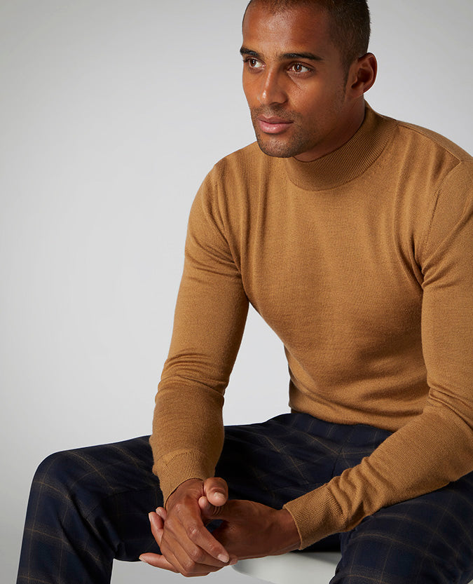 Man wearing a brown Slim Fit Merino Wool-Blend Turtle Neck Sweater