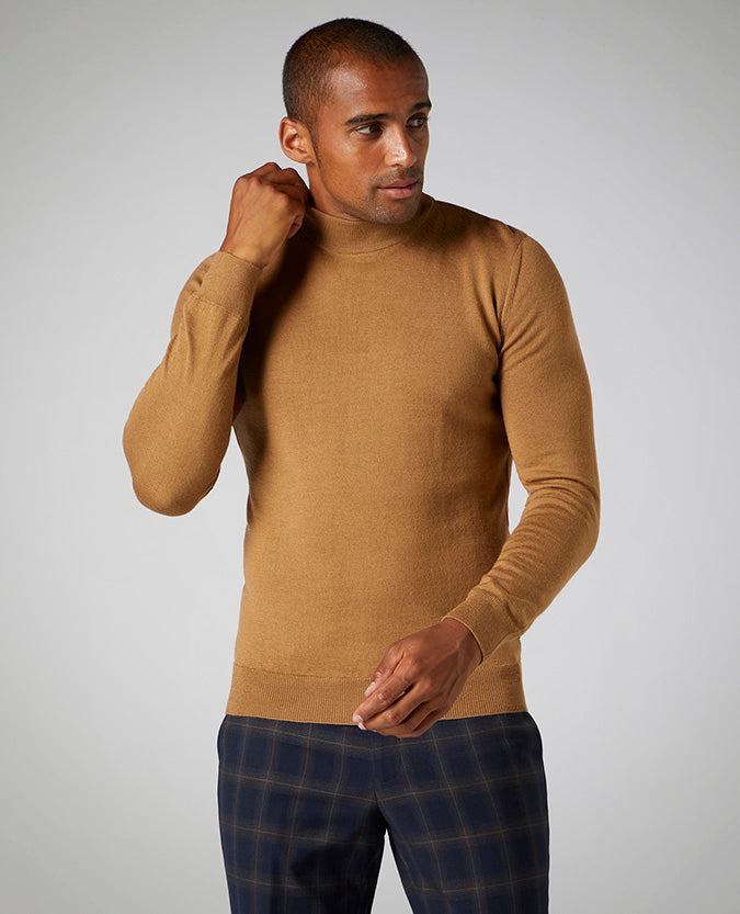 Man wearing a brown Slim Fit Merino Wool-Blend Turtle Neck Sweater