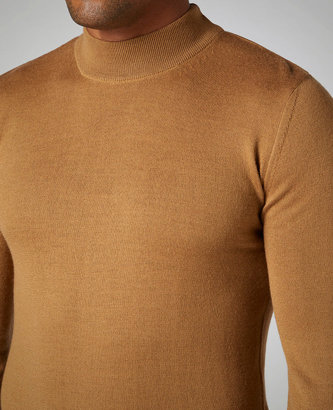 Man wearing a brown Slim Fit Merino Wool-Blend Turtle Neck Sweater