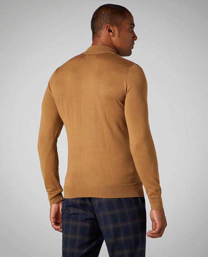 Man wearing a brown Slim Fit Merino Wool-Blend Turtle Neck Sweater