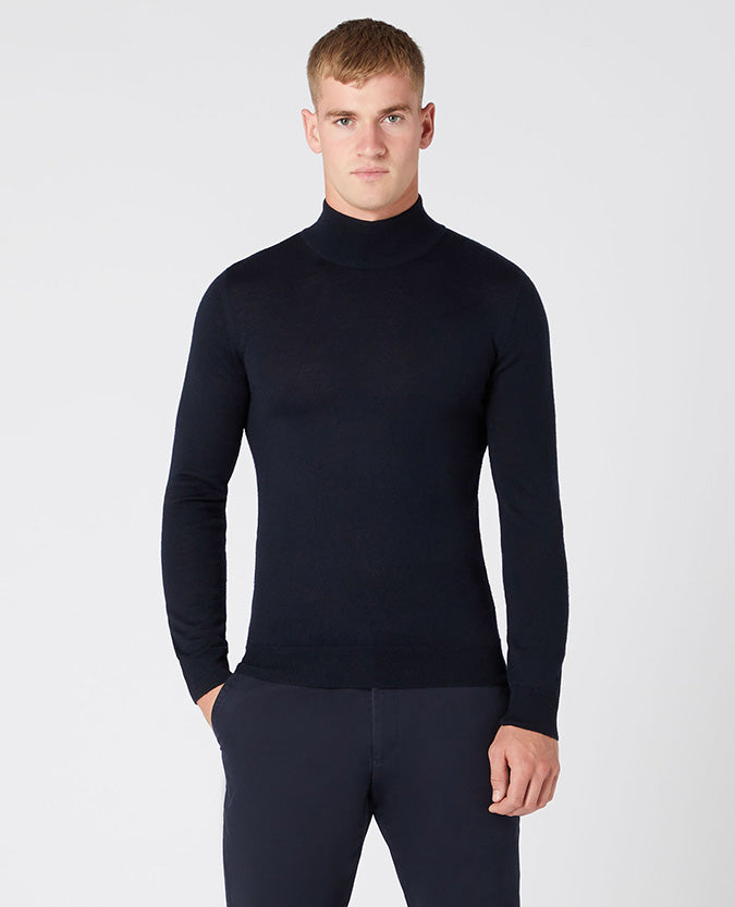 Man wearing a navy Slim Fit Merino Wool-Blend Turtle Neck
