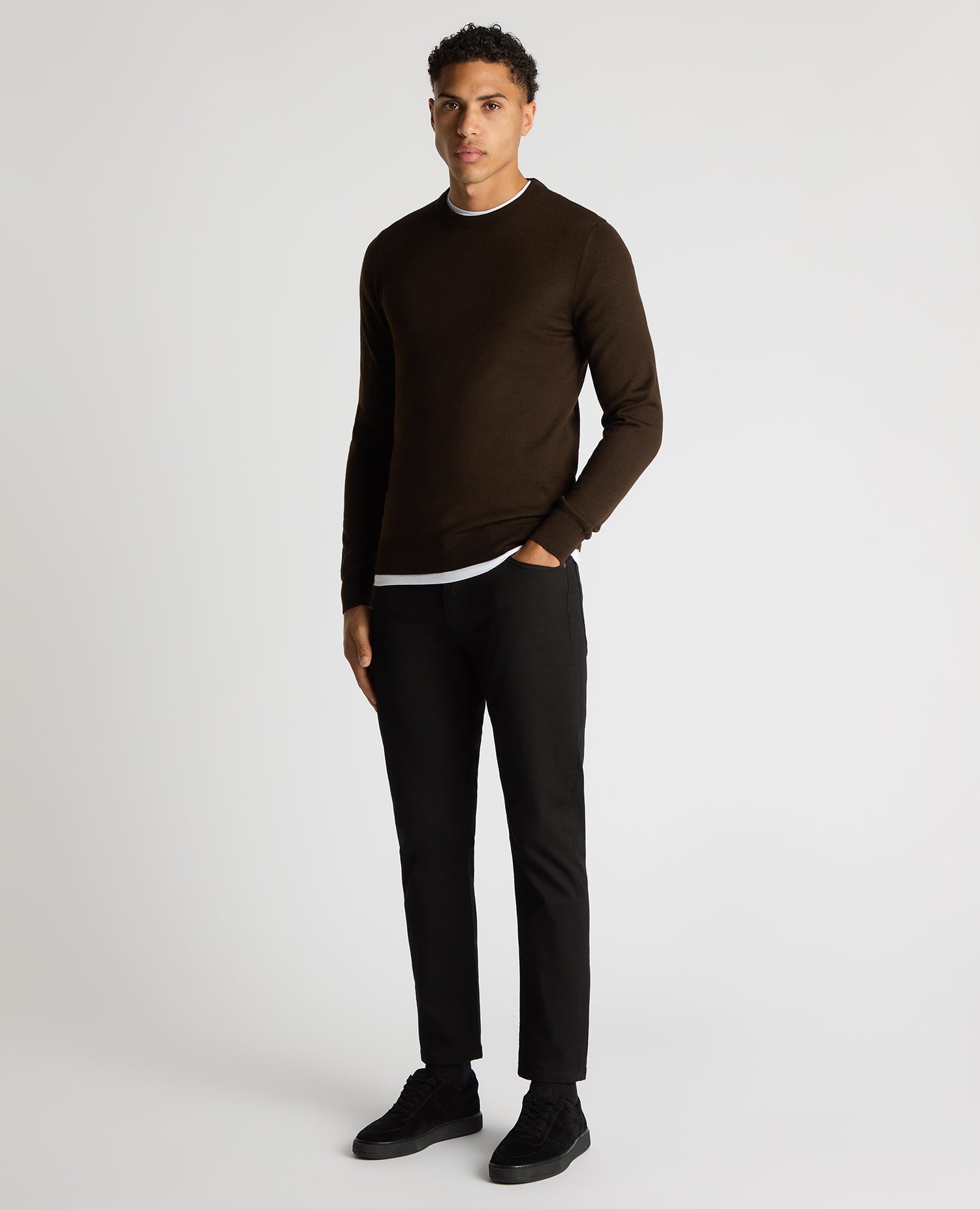 Man wearing a brown Tapered Fit Merino Wool-Blend Crew Neck Sweater