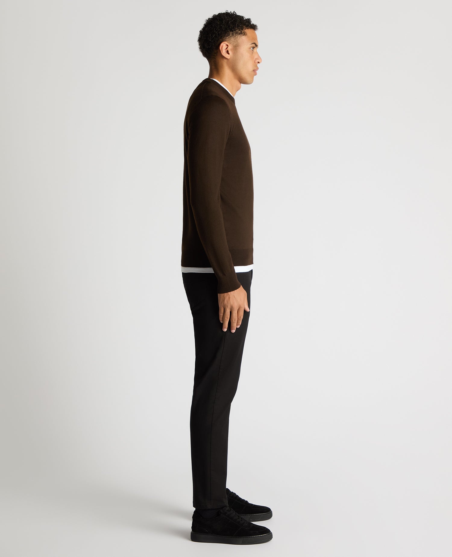 Man wearing a brown Tapered Fit Merino Wool-Blend Crew Neck Sweater