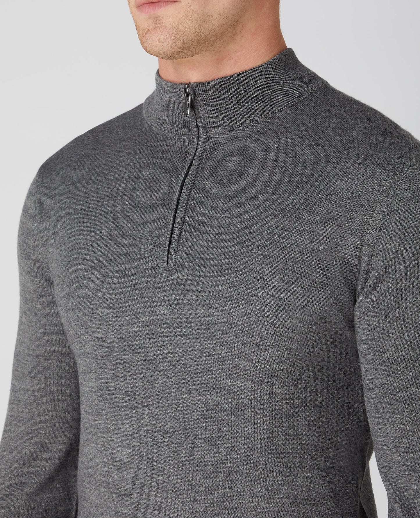 Man wearing a grey Tapered Fit Merino Wool-Blend Half Zip Sweater