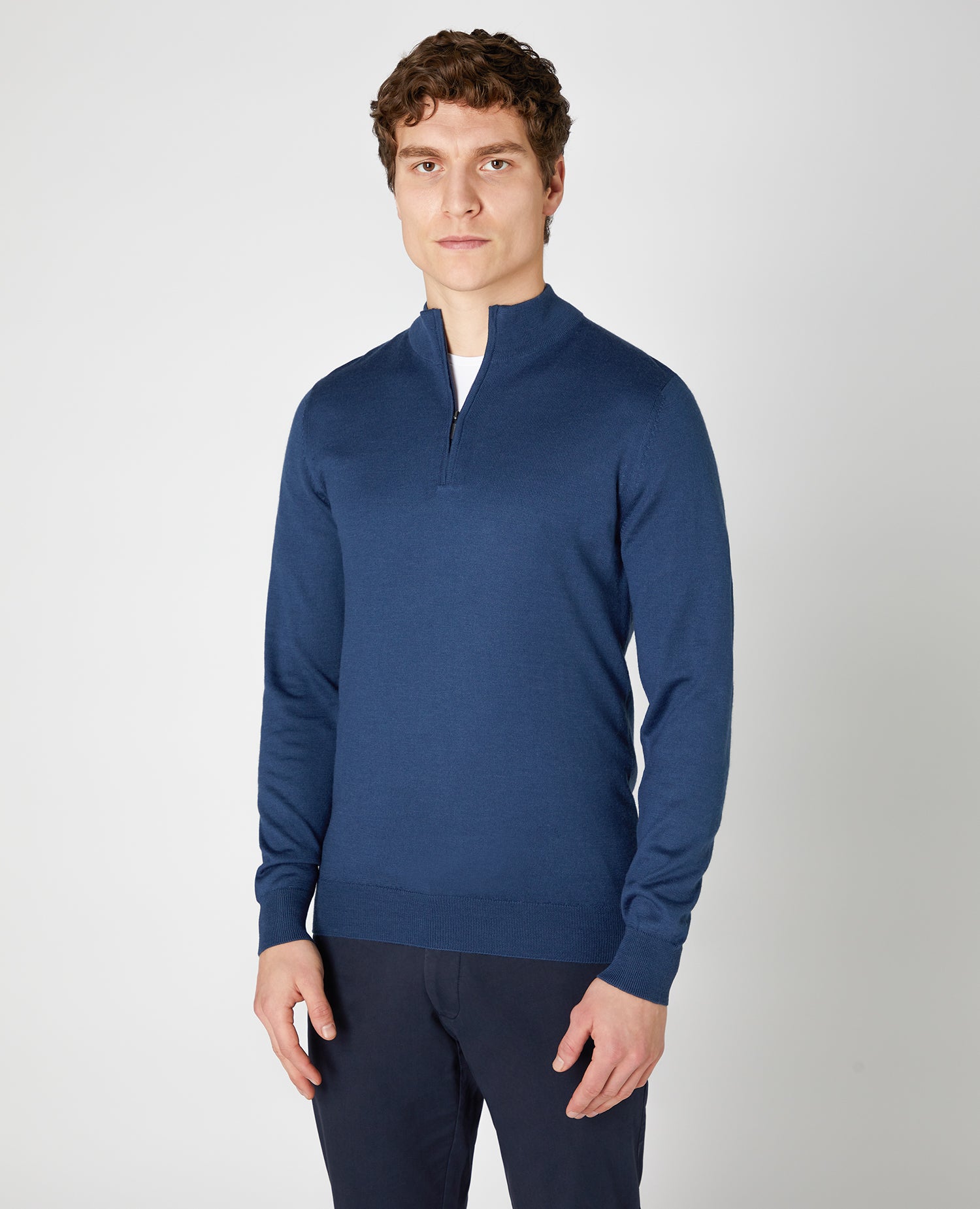 Man wearing a blue Tapered fit Merino Wool- Blend Half Zip Sweater