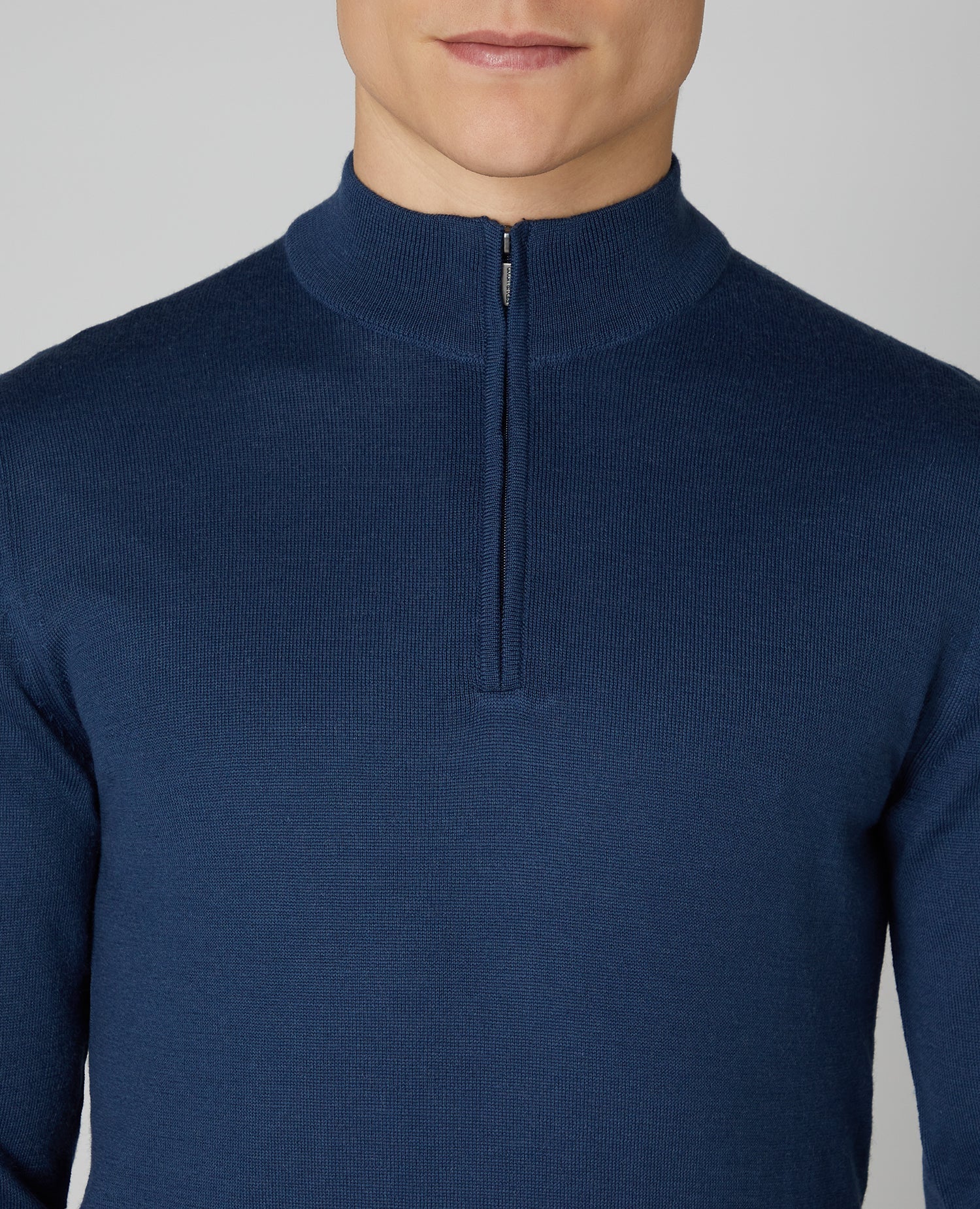 Man wearing a blue Tapered fit Merino Wool- Blend Half Zip Sweater