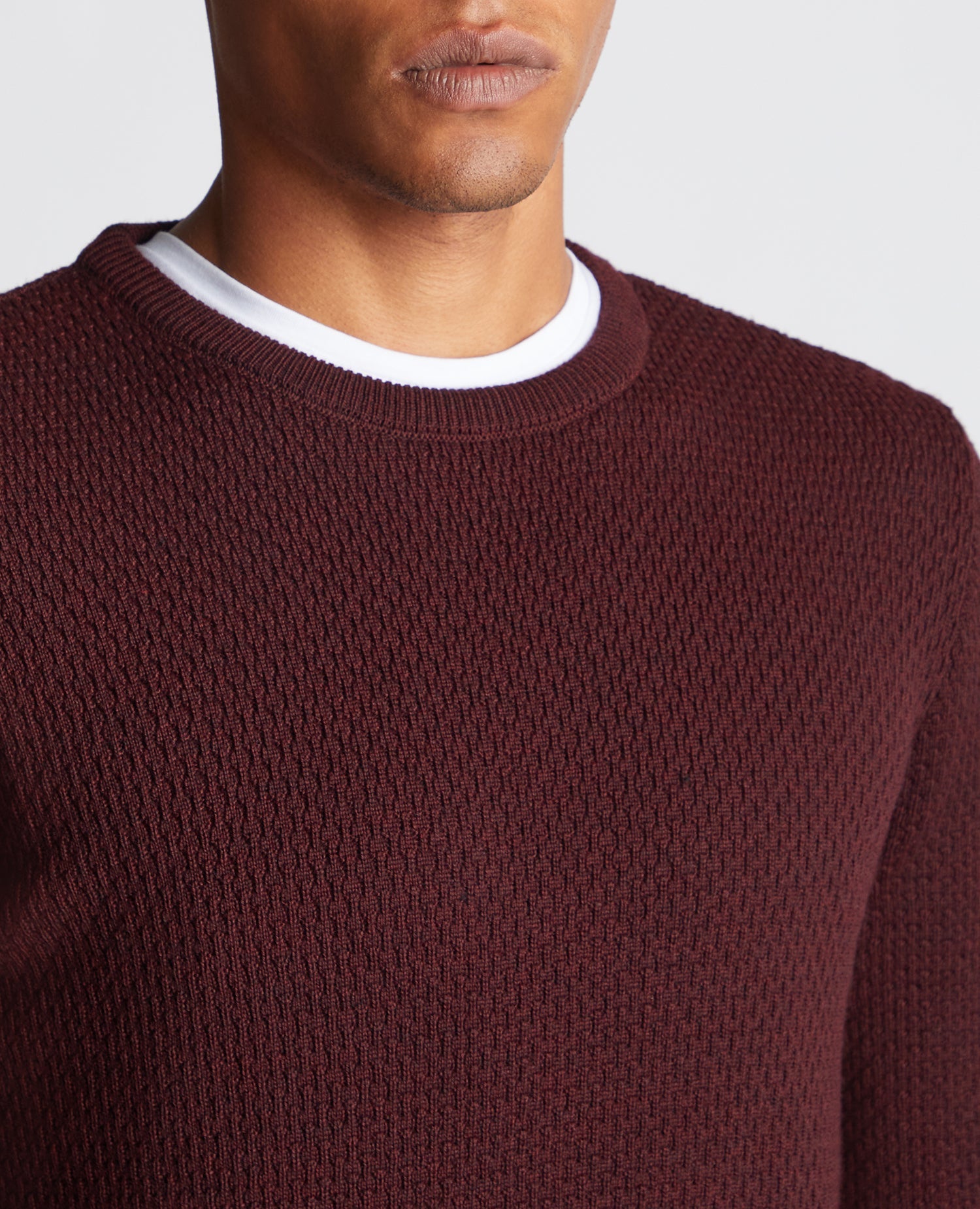 Man wearing a red Slim Fit Merino Wool-Blend Sweater