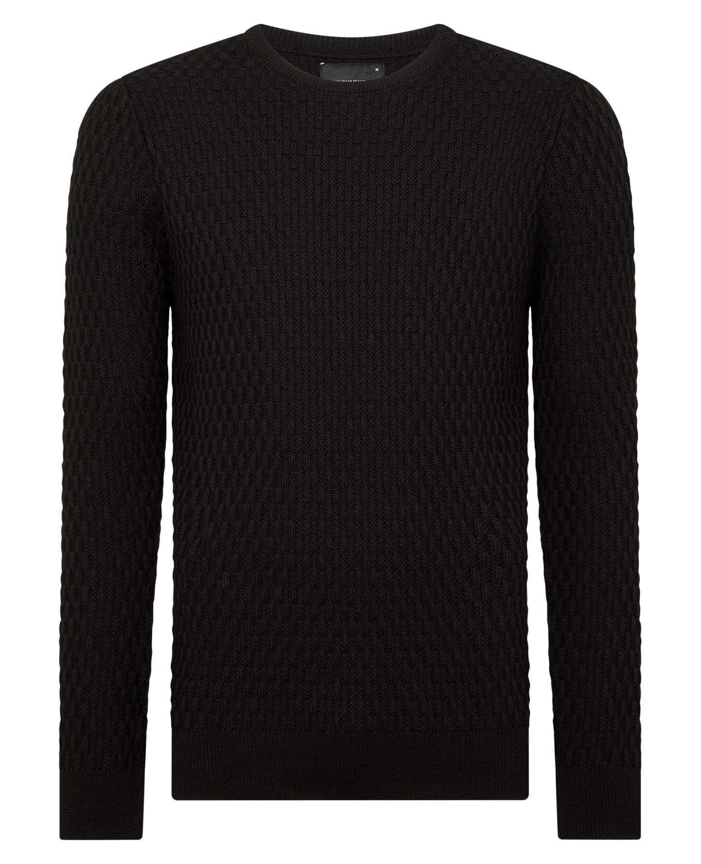 Man wearing a black Tapered Fit Merino Wool-Blend Sweater