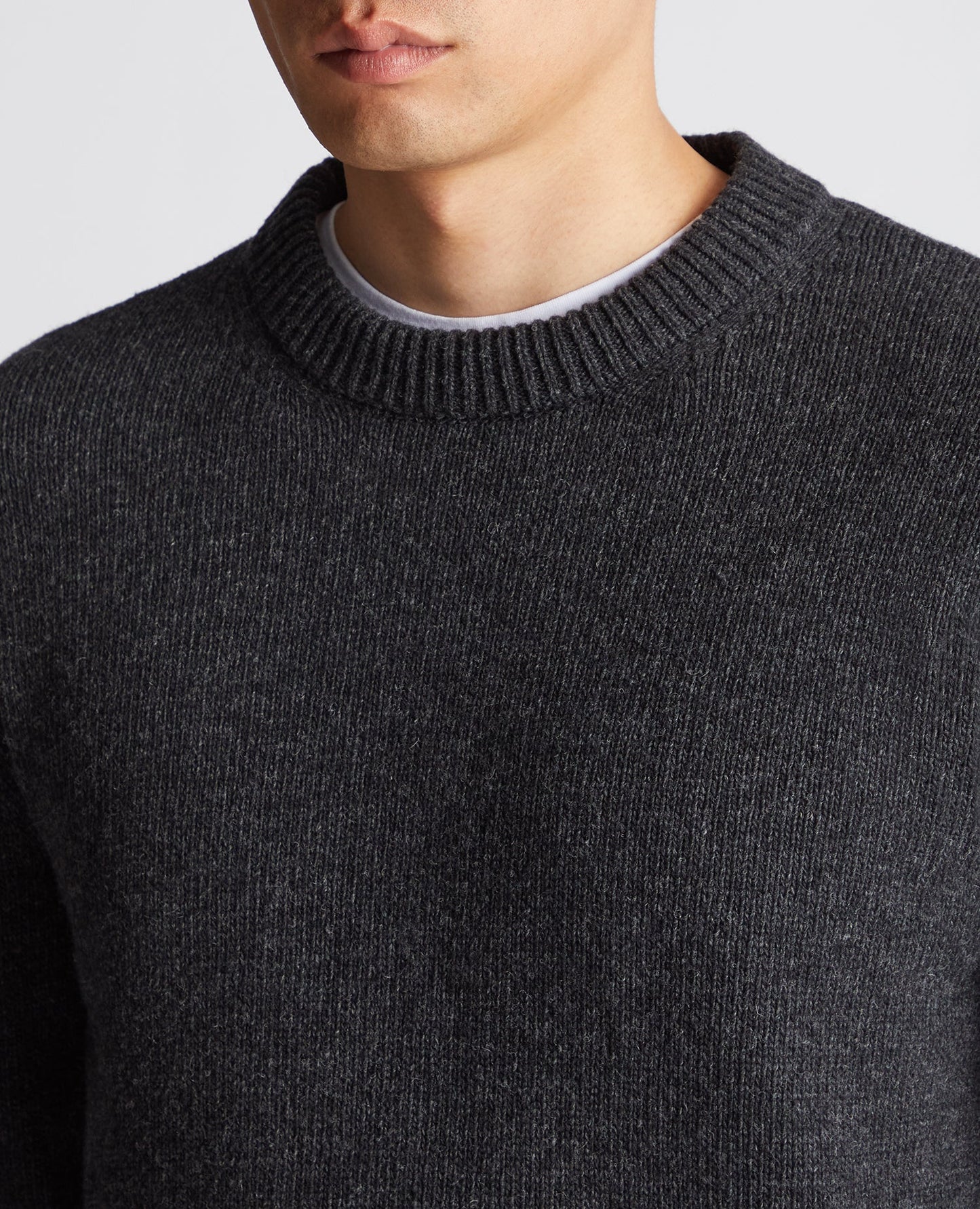 Man wearing a grey Tapered Fit Wool-Blend Crew Neck Sweater