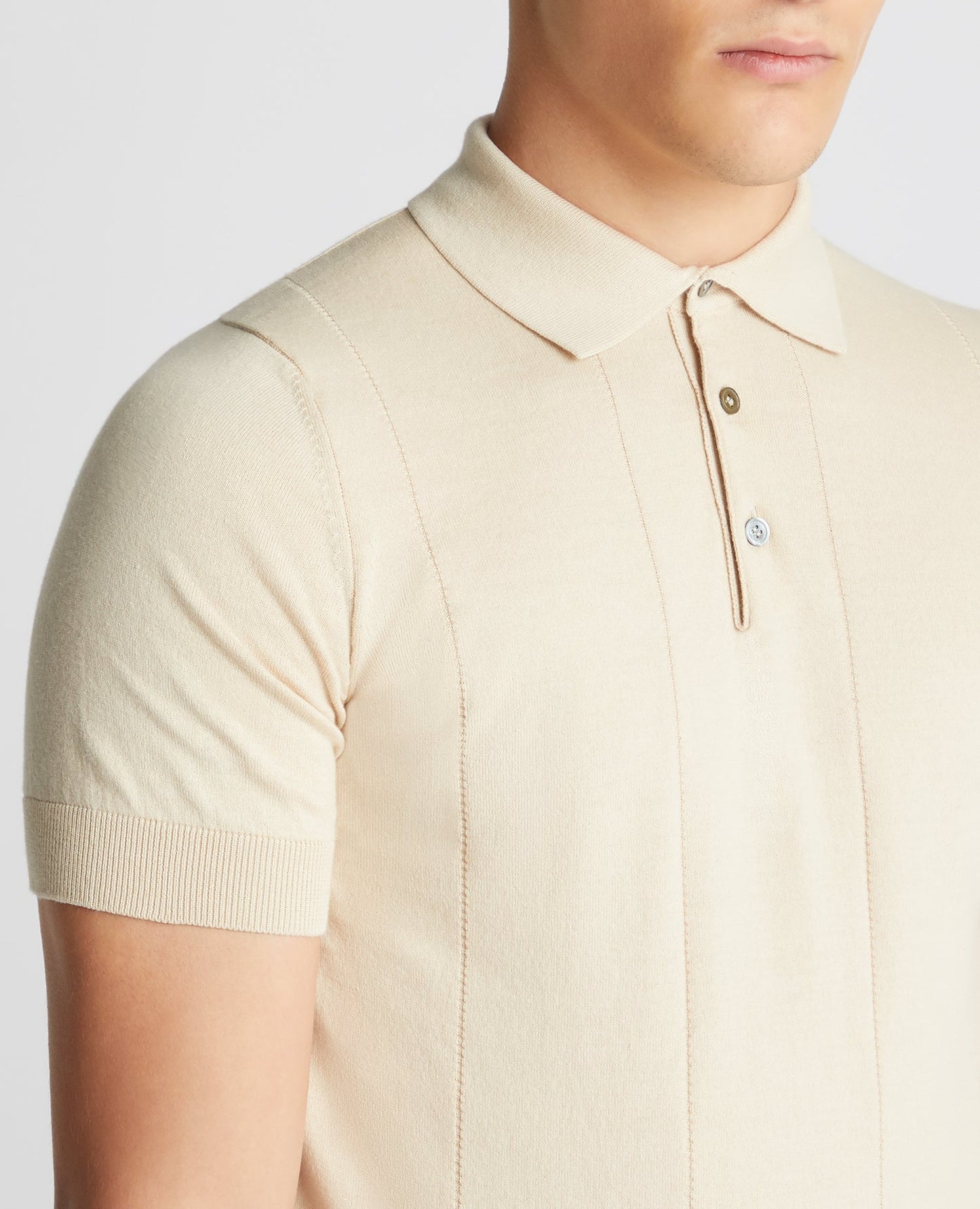Man wearing a sand Slim Fit Knitted Cotton Short-Sleeve Polo