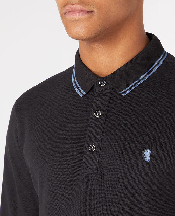 Man wearing a black Slim Fit Cotton-Stretch Pique Polo Shirt