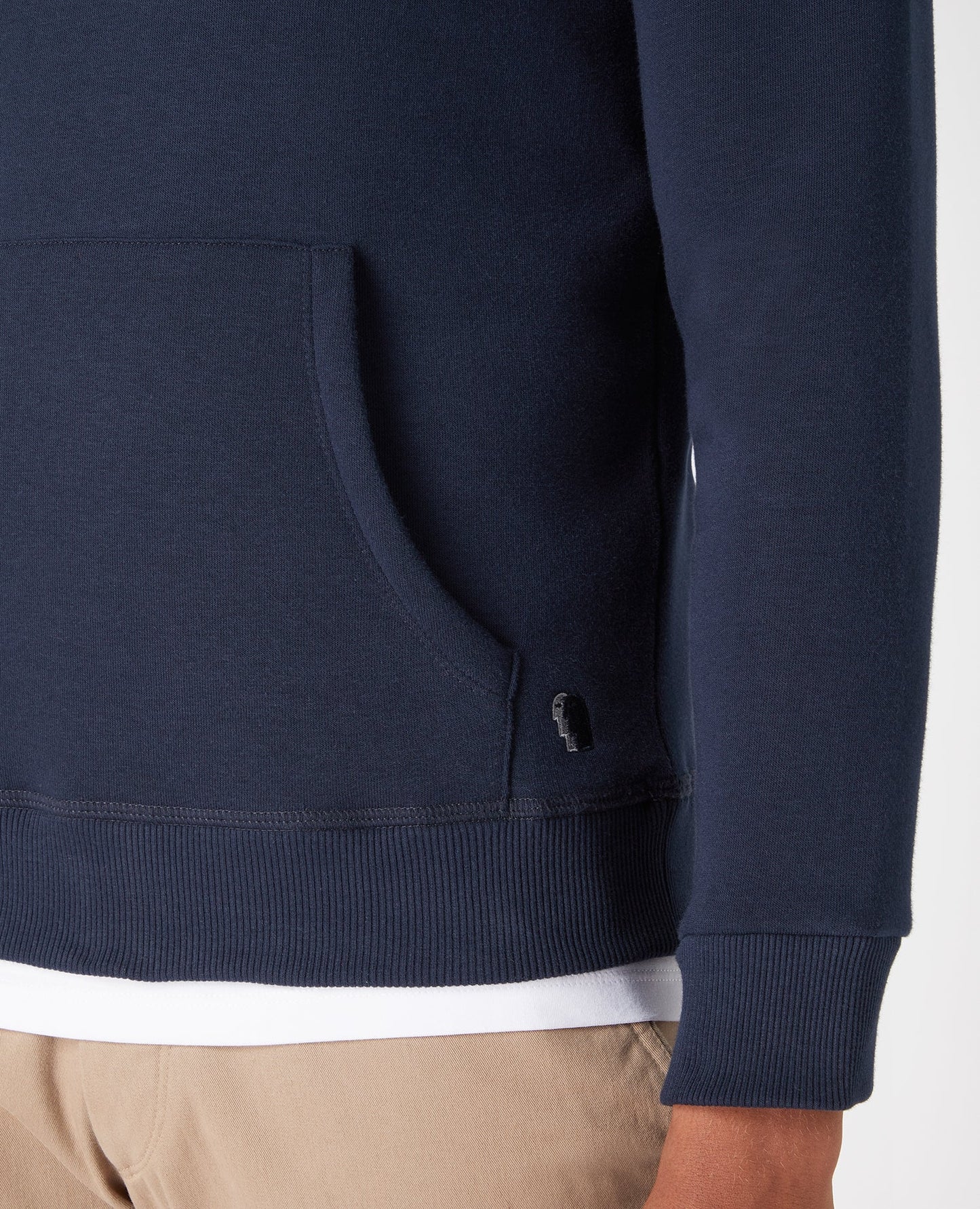 Man wearing a navy Tapered Fit Cotton-Blend Hoodie