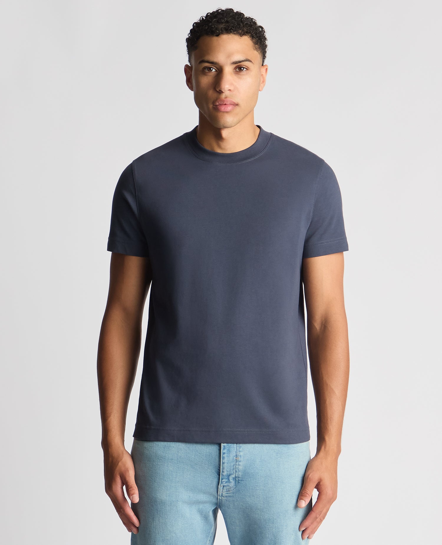 Man wearing a navy Regular Fit Organic Cotton T-Shirt