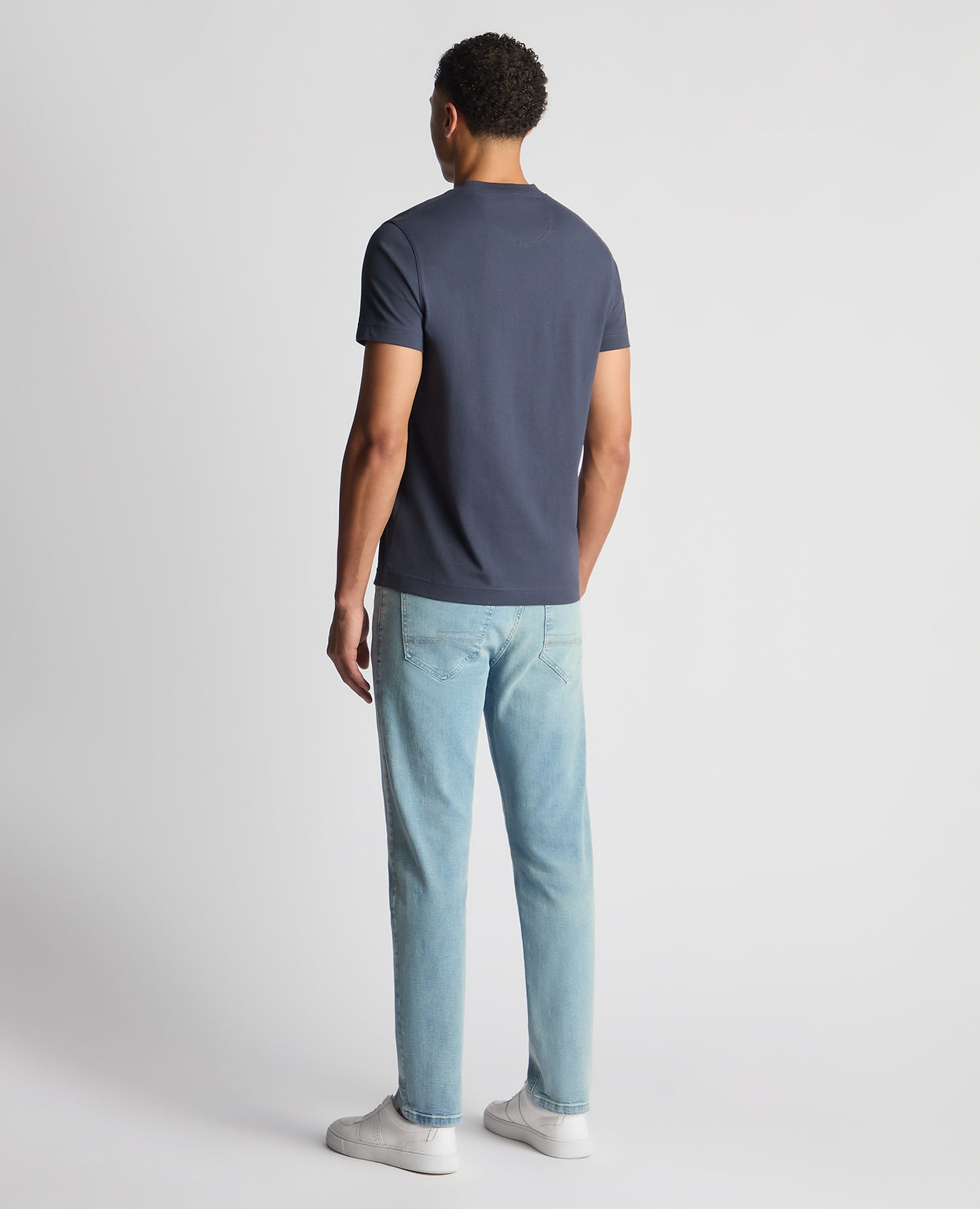 Man wearing a navy Regular Fit Organic Cotton T-Shirt