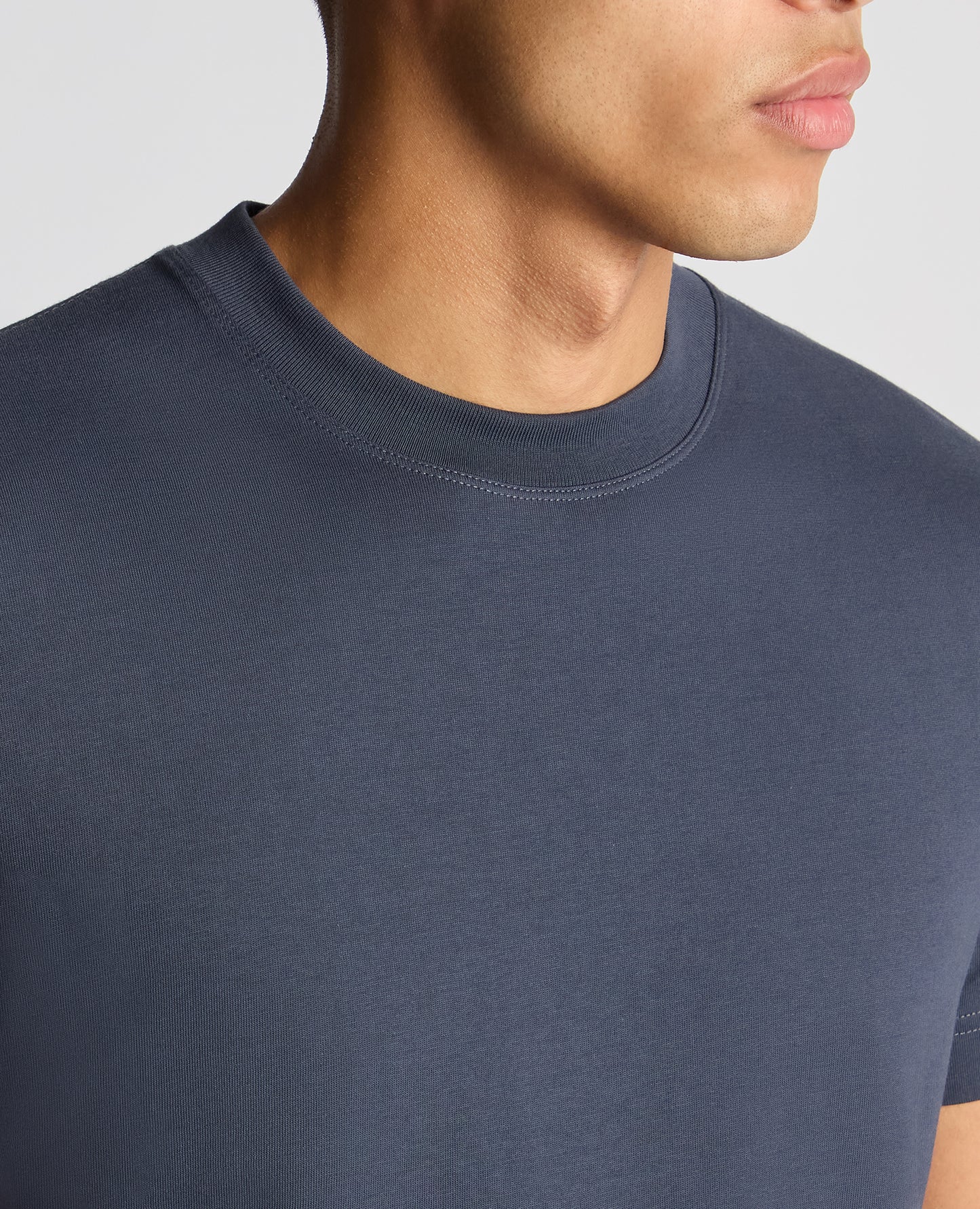Man wearing a navy Regular Fit Organic Cotton T-Shirt