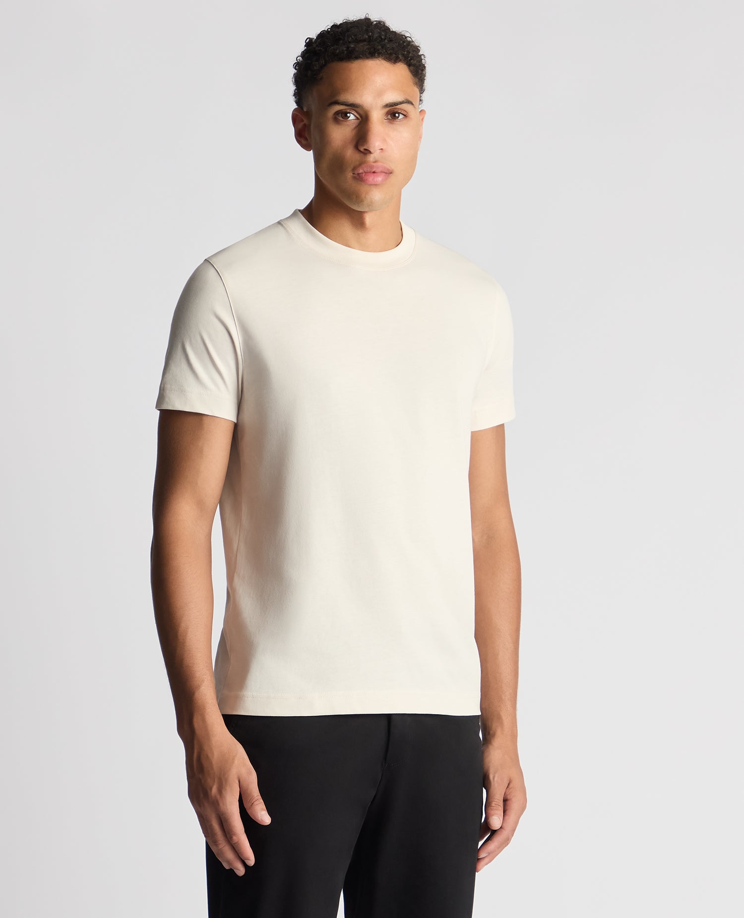Man wearing a sand Relaxed Fit Organic Cotton T-Shirt