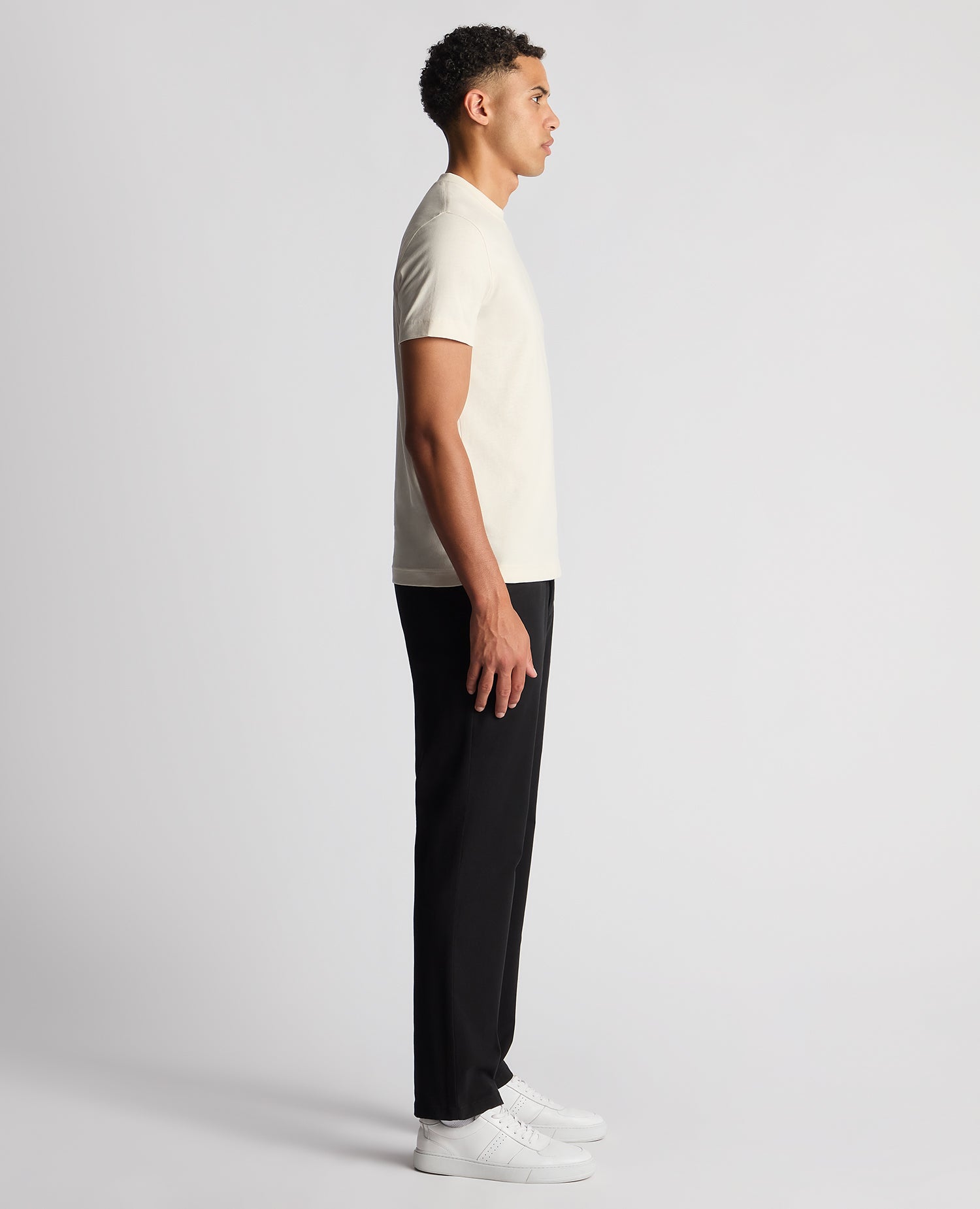 Man wearing a sand Relaxed Fit Organic Cotton T-Shirt