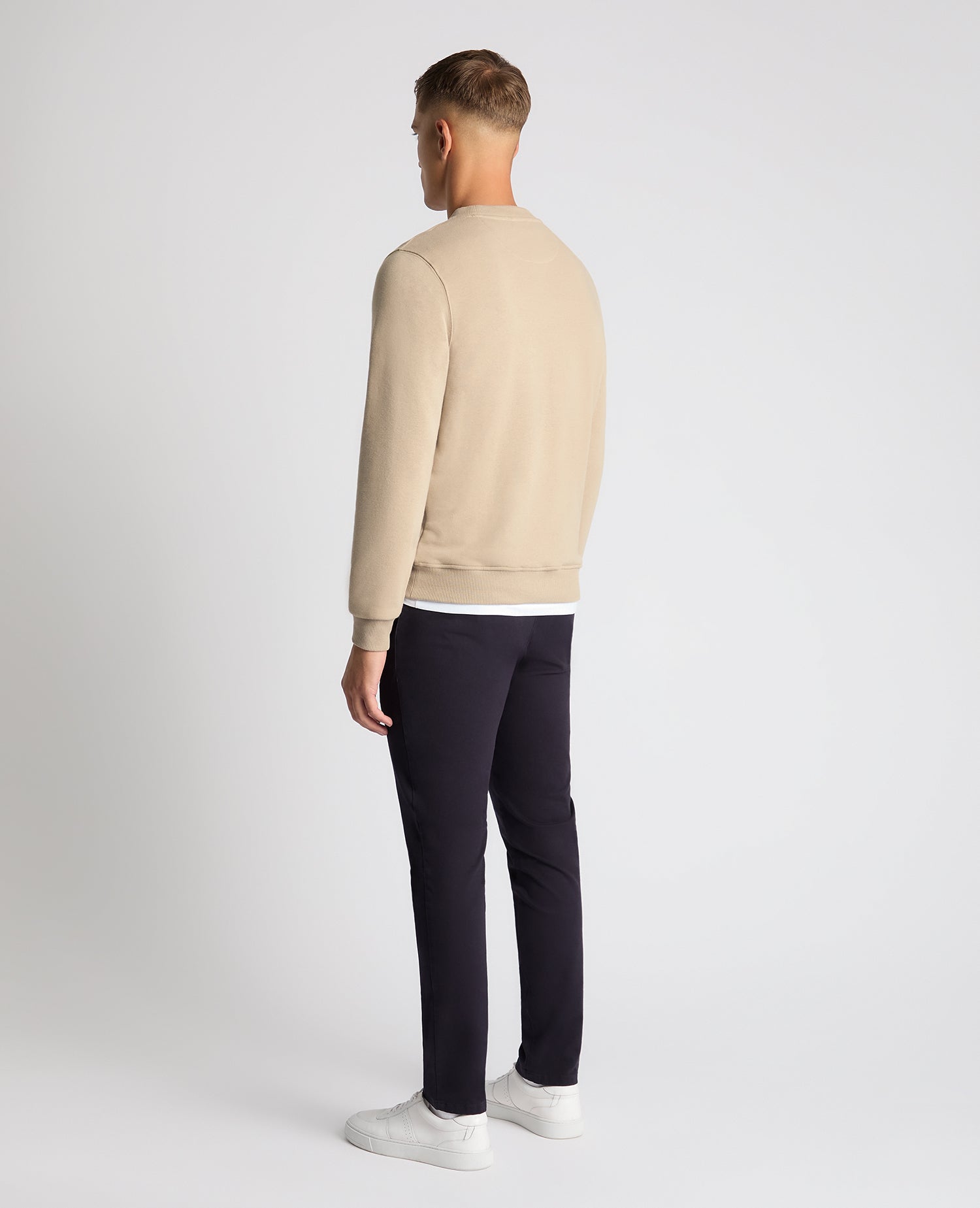Man wearing a sand Tapered Fit Soft Touch Cotton-Blend Sweatshirt