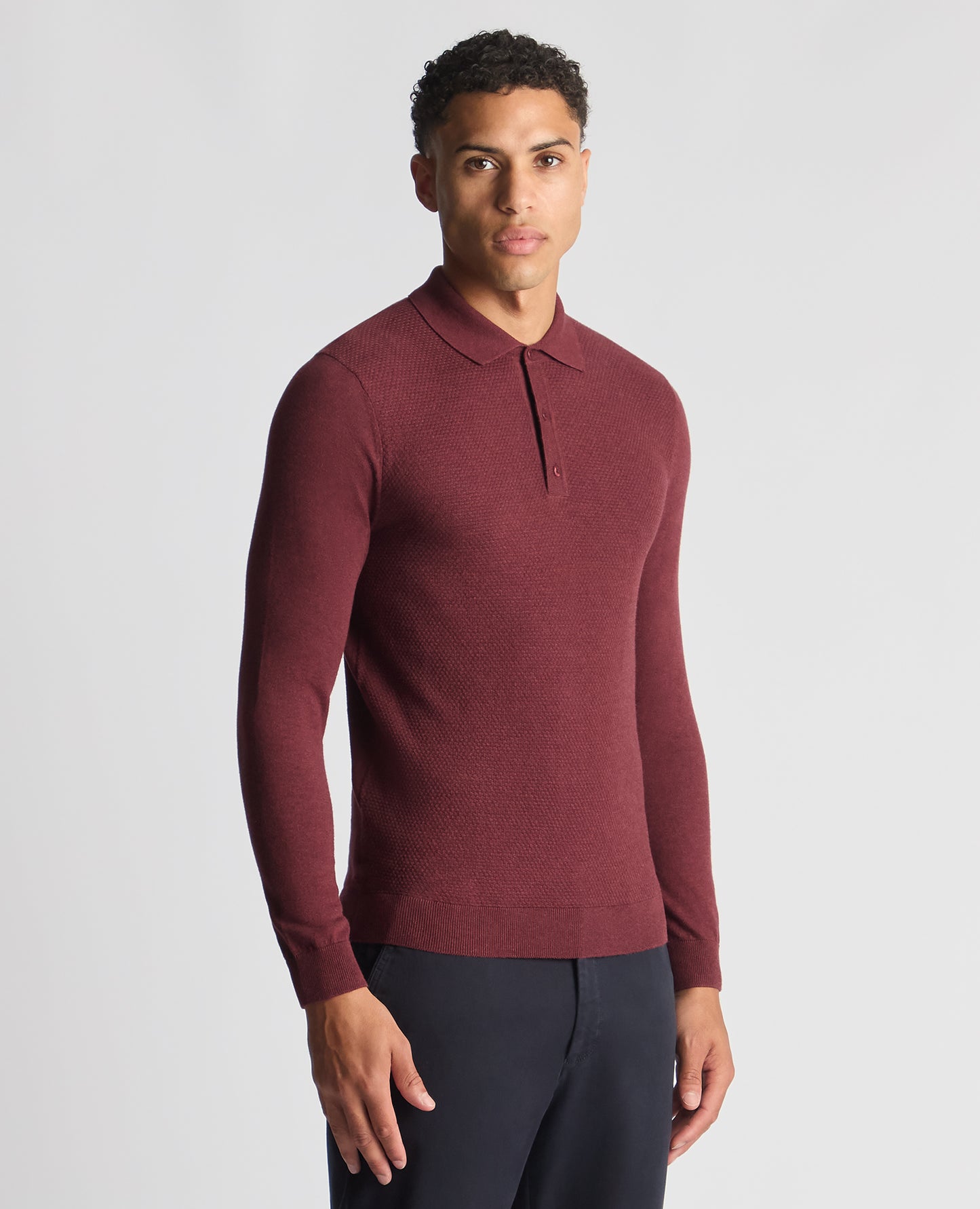 Man wearing a red Slim Fit Cotton Knitted Polo