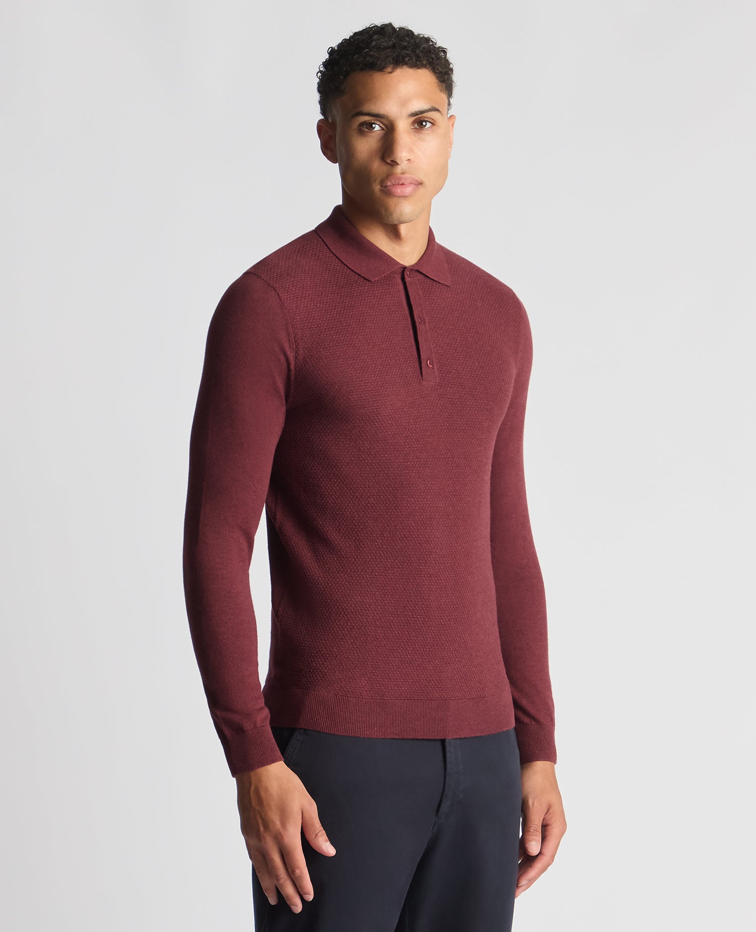 Man wearing a red Slim Fit Cotton Knitted Polo