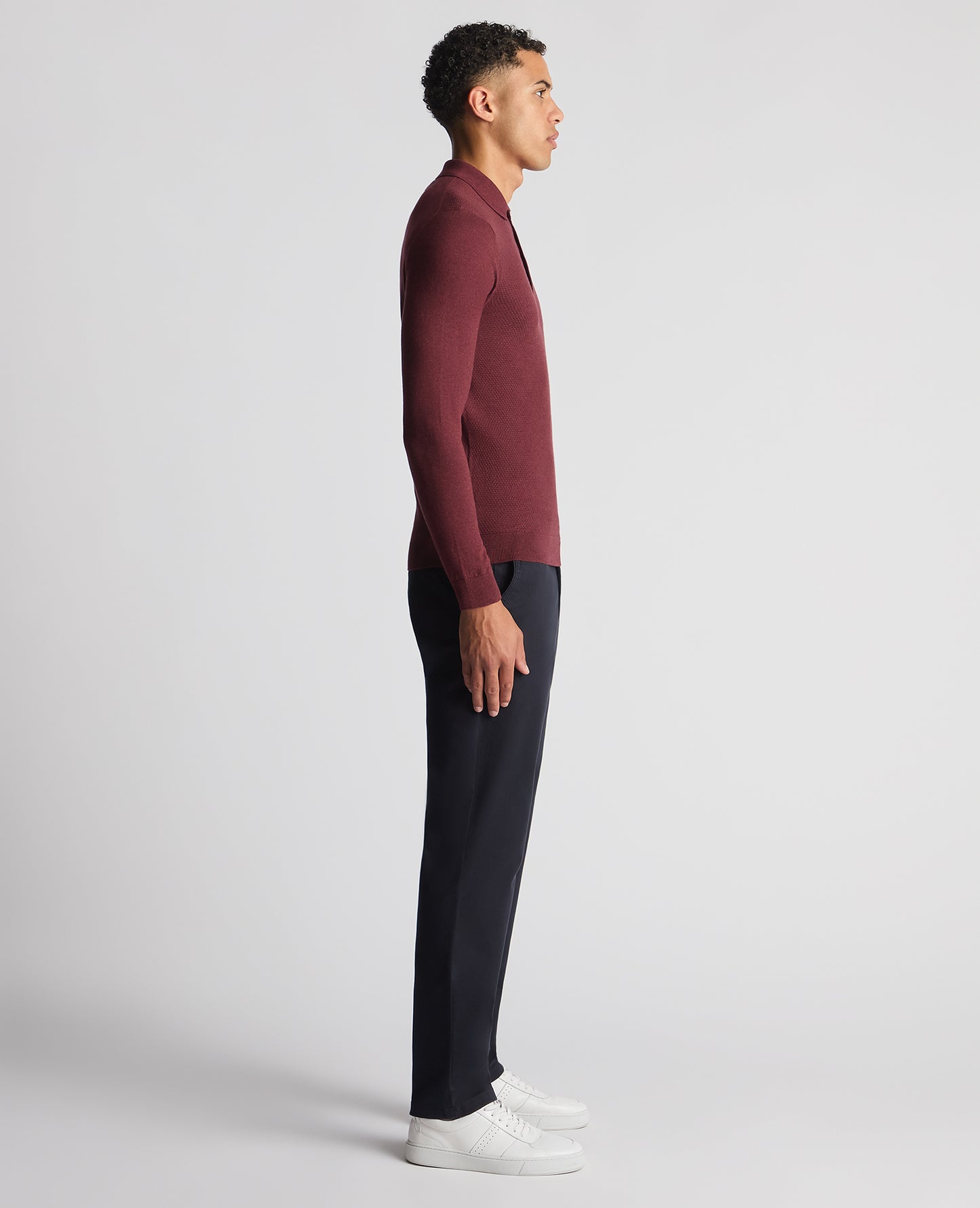 Man wearing a red Slim Fit Cotton Knitted Polo