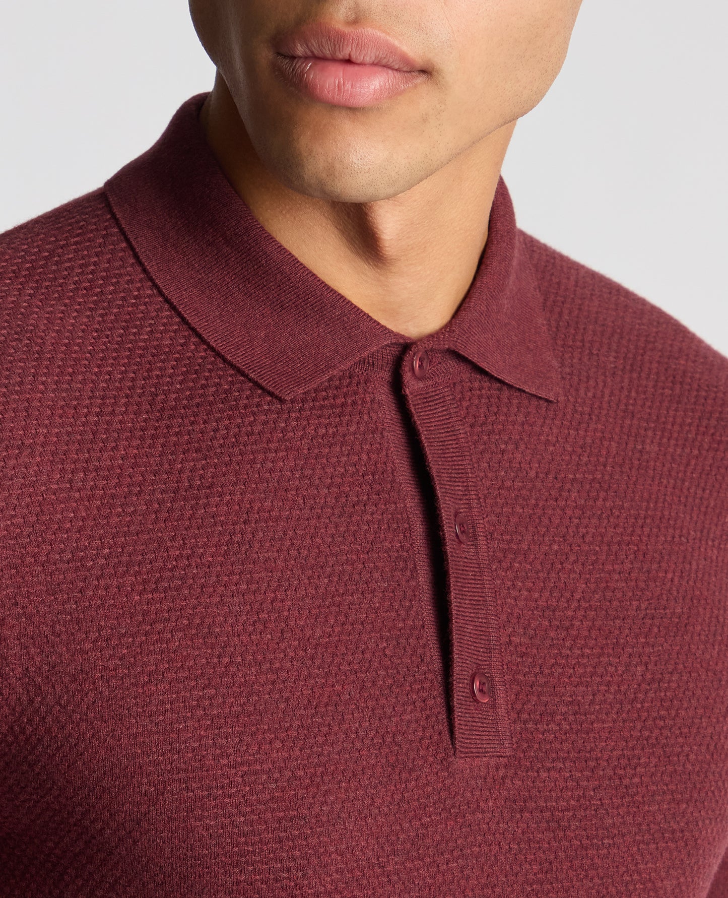 Man wearing a red Slim Fit Cotton Knitted Polo