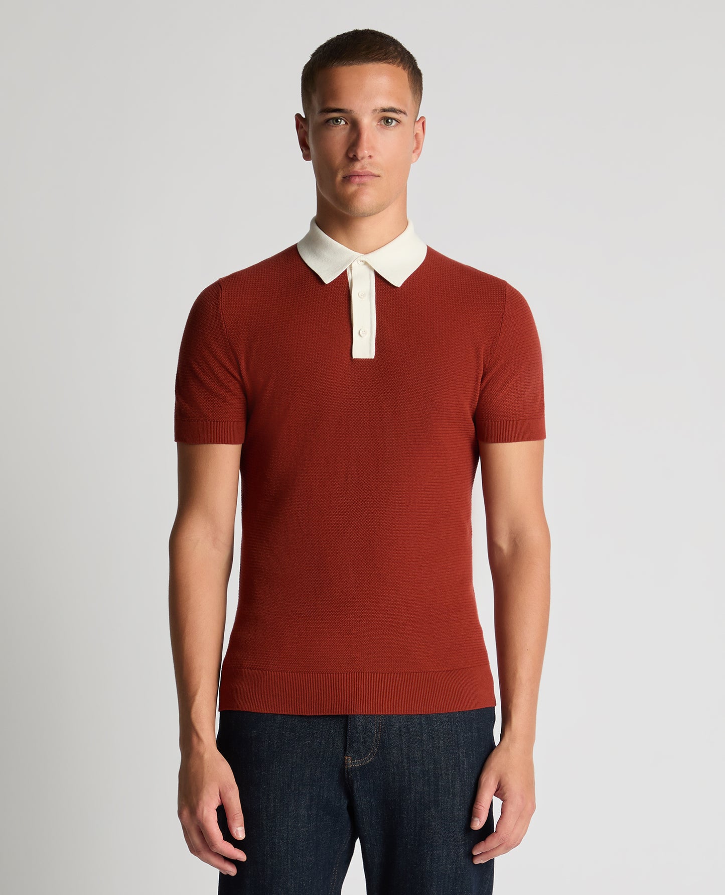 Man wearing a orange Slim Fit Cotton Polo Shirt