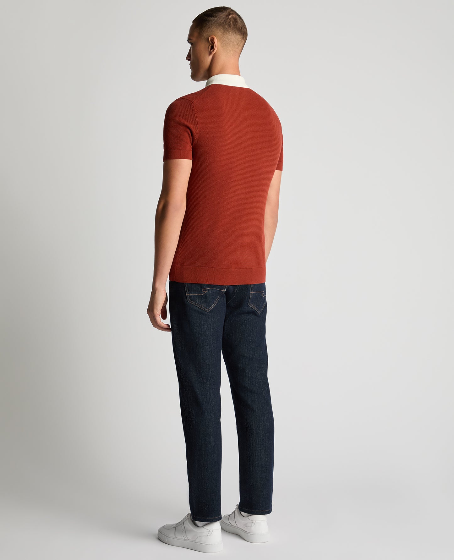 Man wearing a orange Slim Fit Cotton Polo Shirt