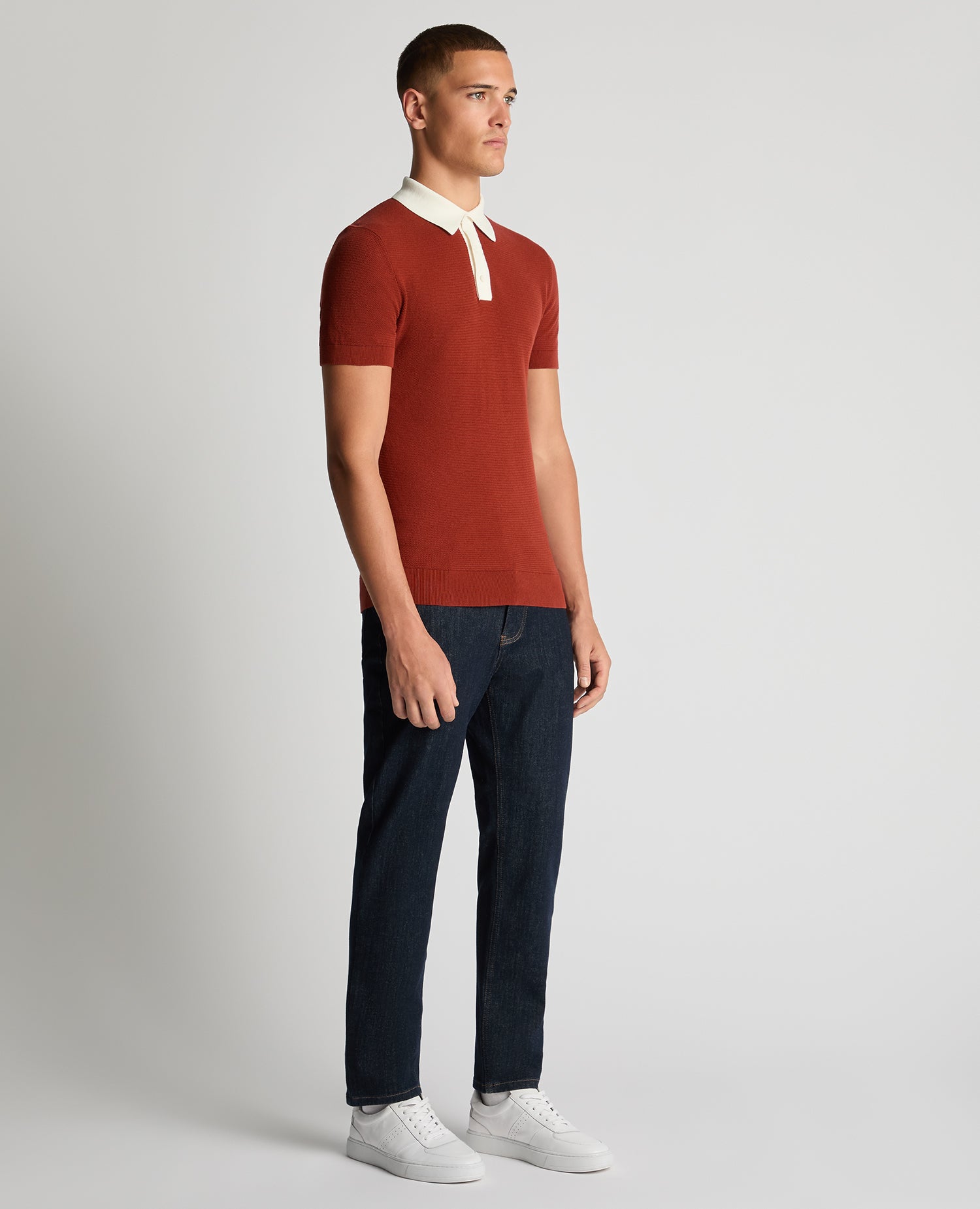 Man wearing a orange Slim Fit Cotton Polo Shirt