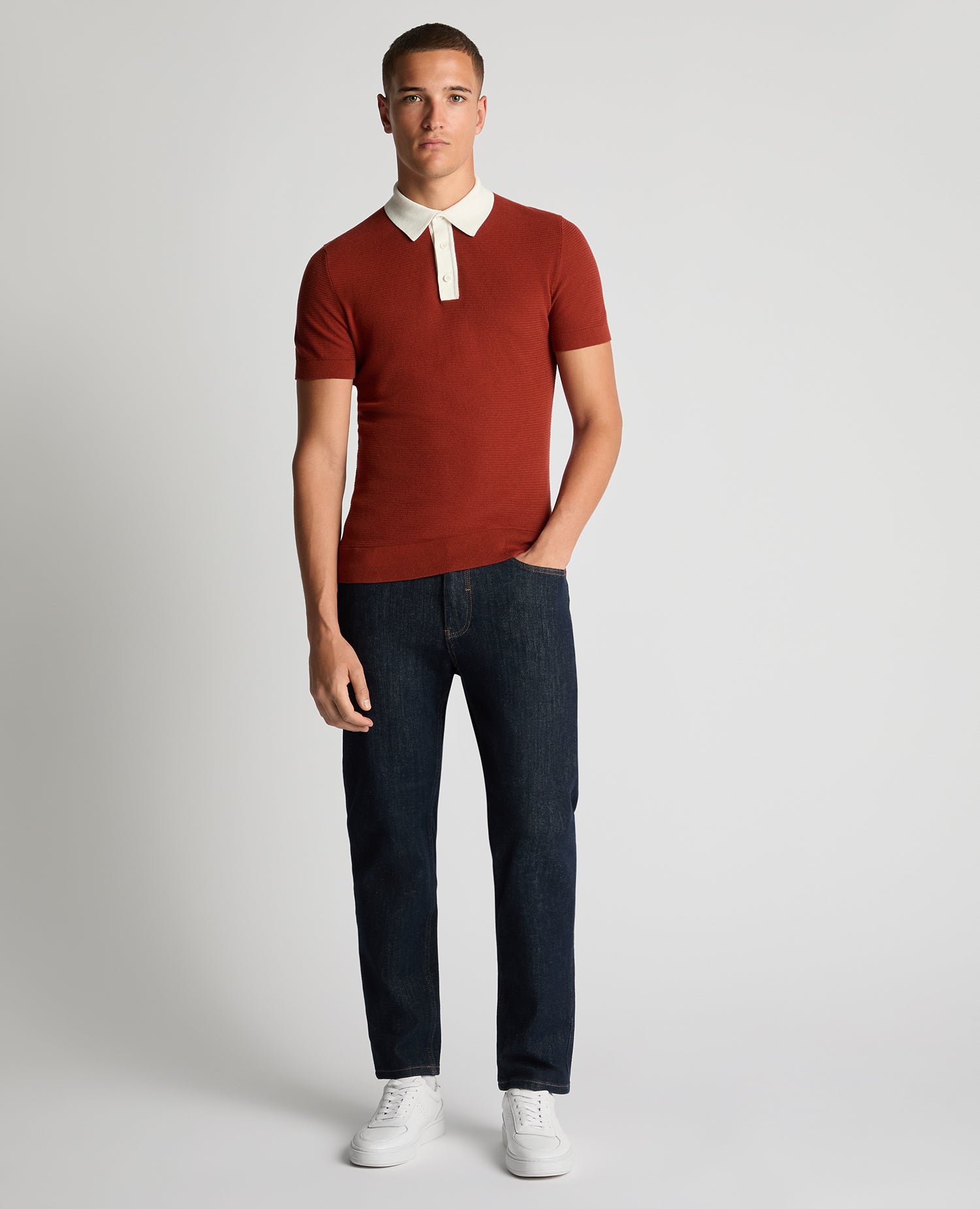 Man wearing a orange Slim Fit Cotton Polo Shirt