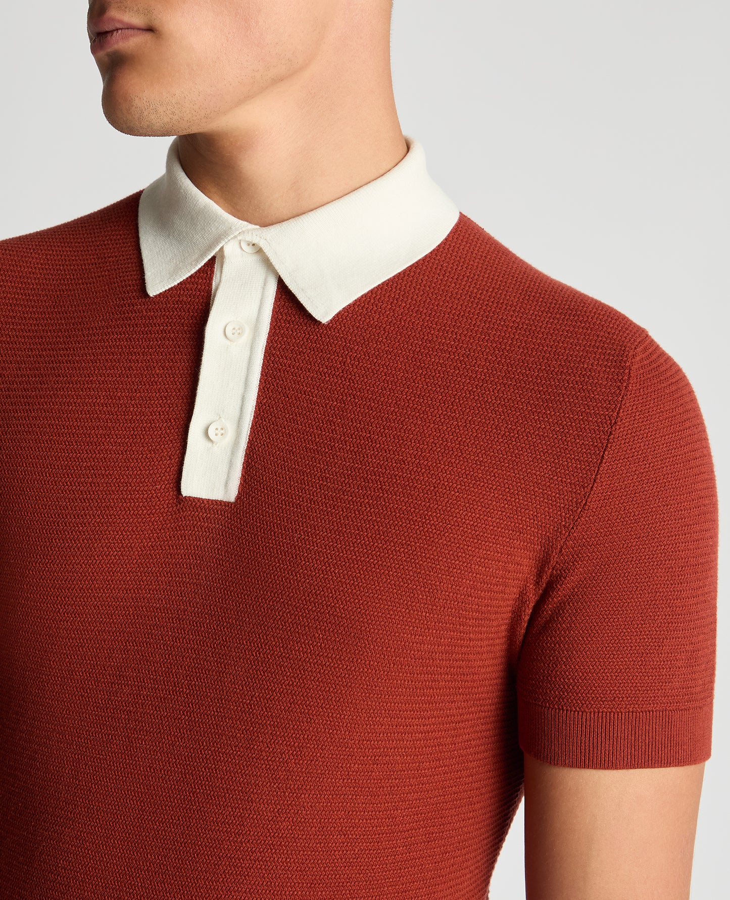 Man wearing a orange Slim Fit Cotton Polo Shirt