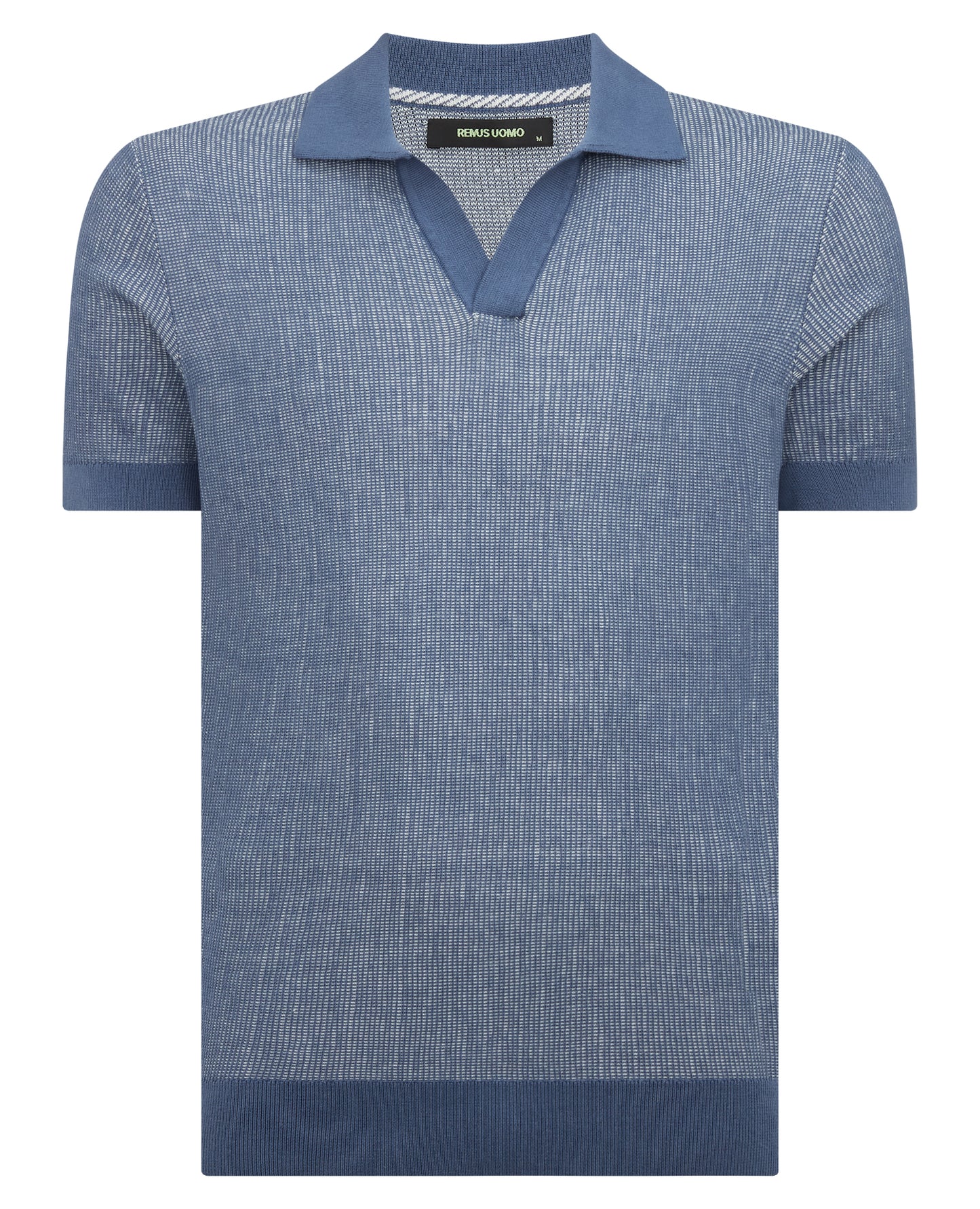 Man wearing a blue Slim Fit Textured Knit Polo