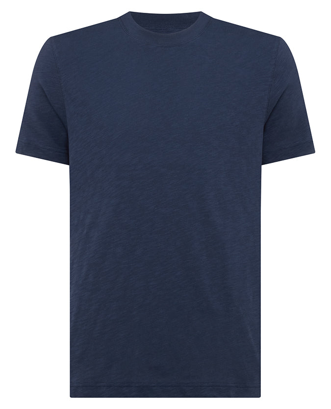 Man wearing a navy Tapered Fit Cotton Crew Neck Tee
