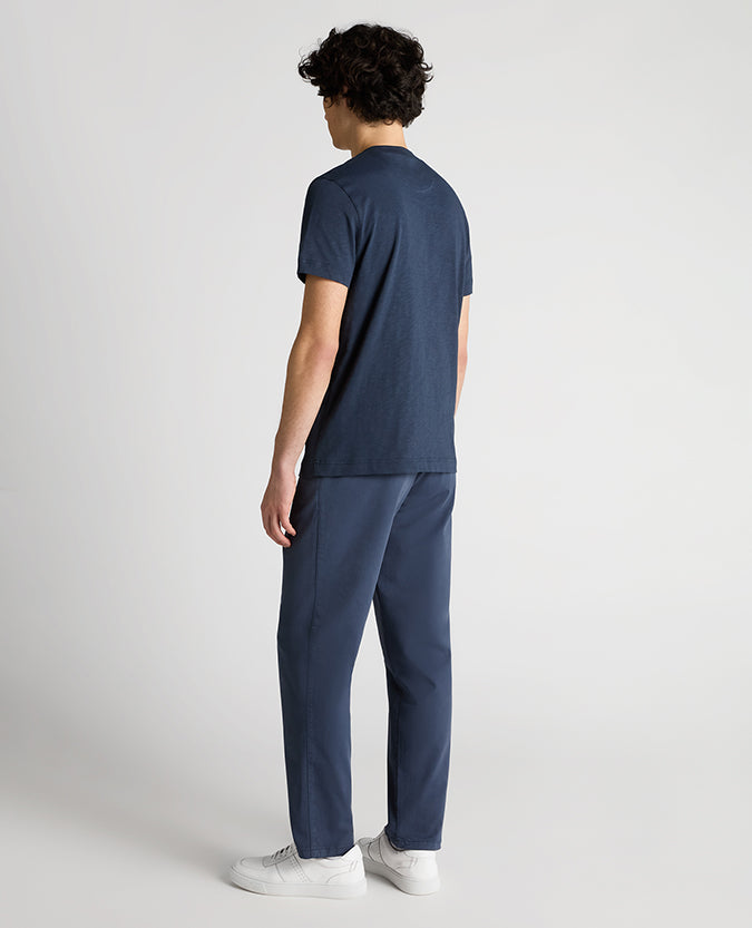 Man wearing a navy Tapered Fit Cotton Crew Neck Tee