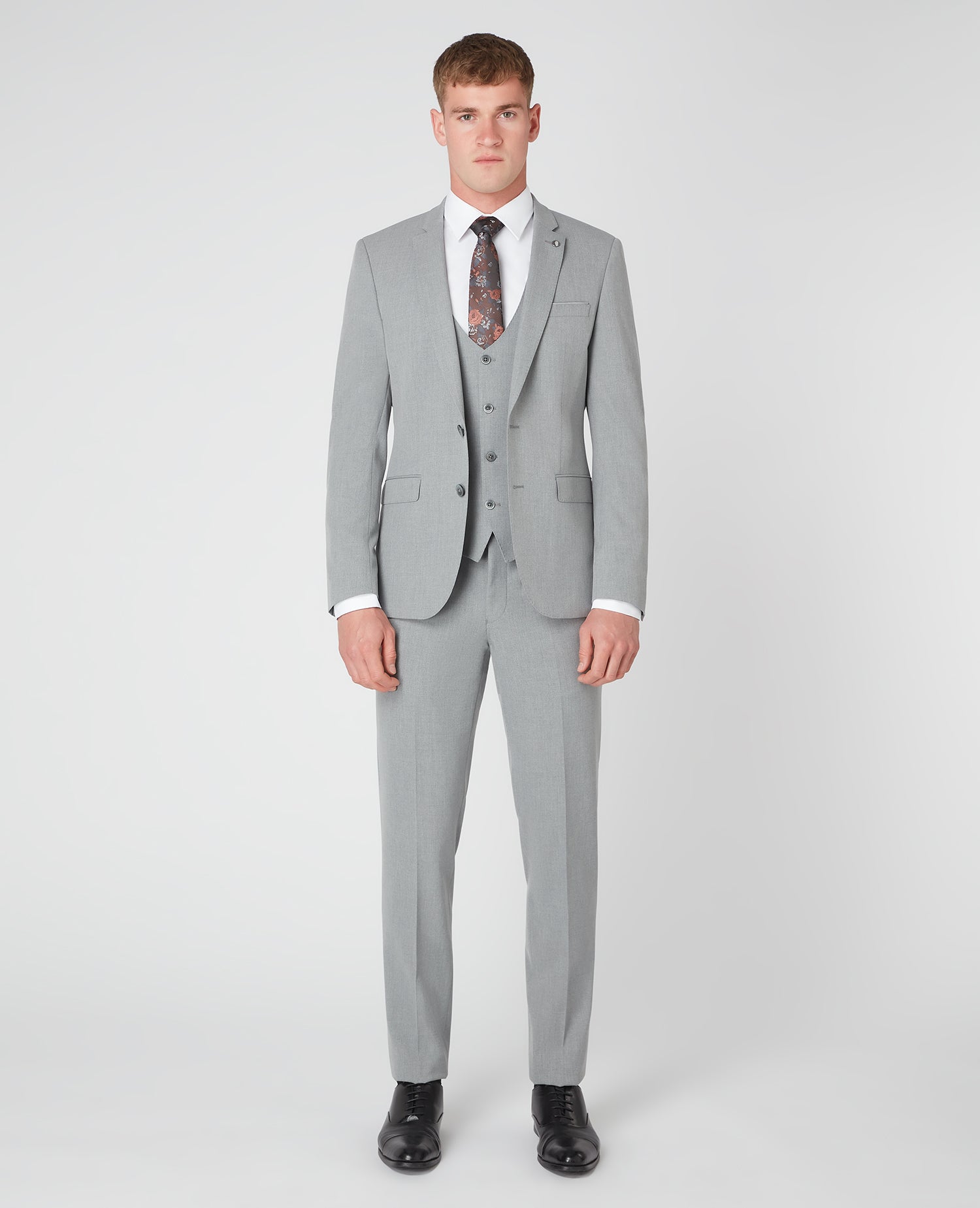 Man wearing a grey X-Slim Fit Stretch Mix and Match Suit