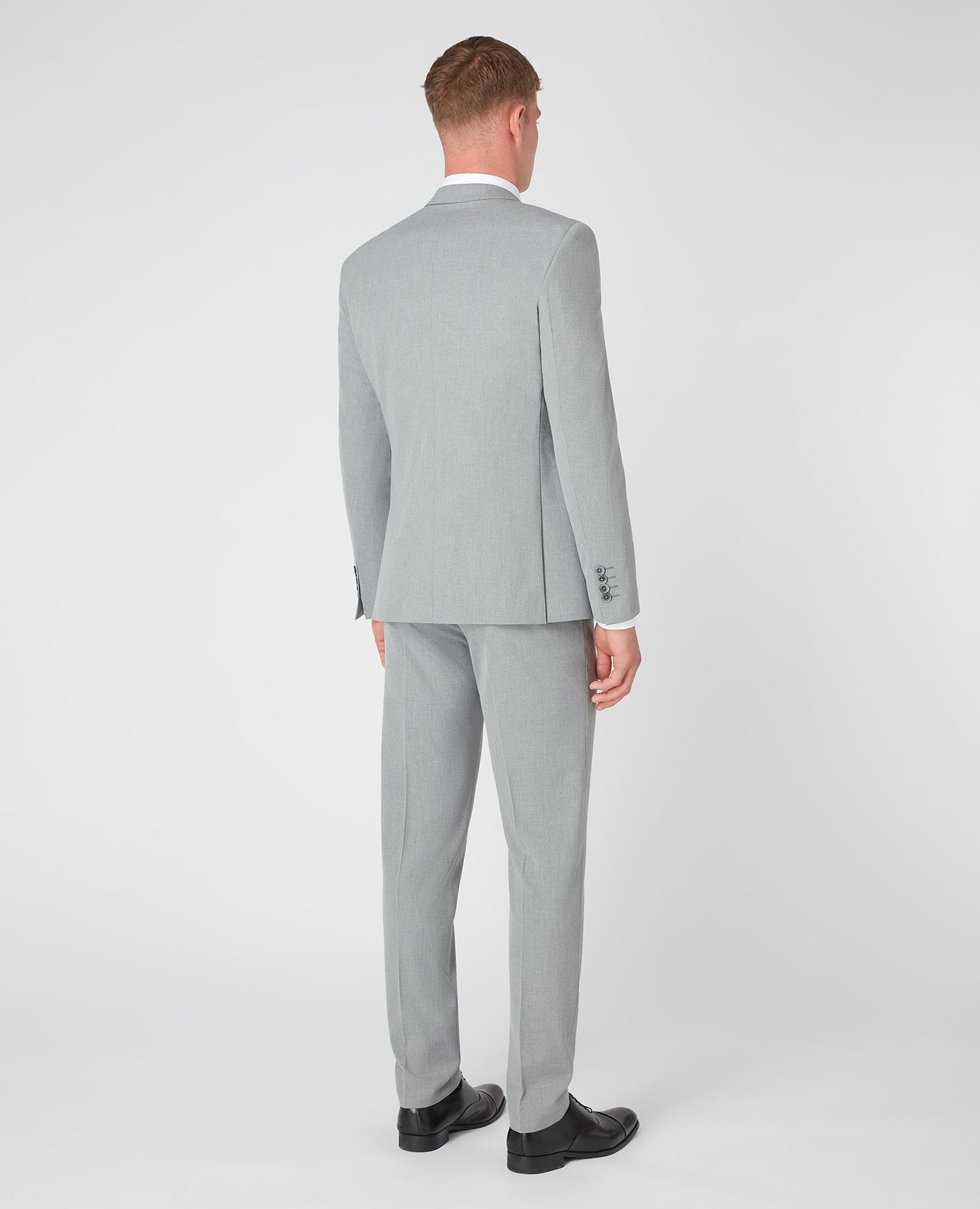 Man wearing a grey X-Slim Fit Stretch Mix and Match Suit