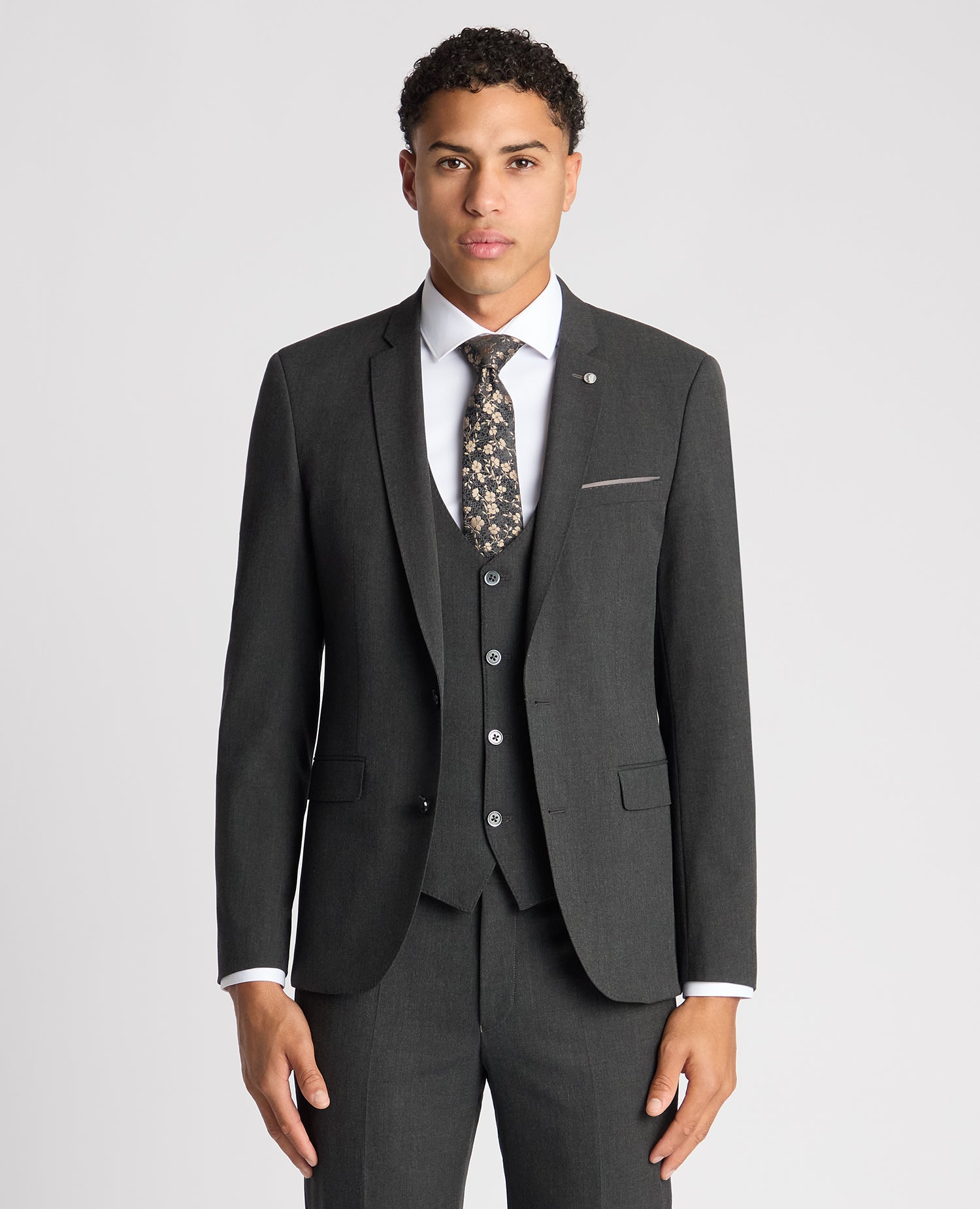 Man wearing a grey X-Slim Fit Stretch Mix and Match Suit Jacket