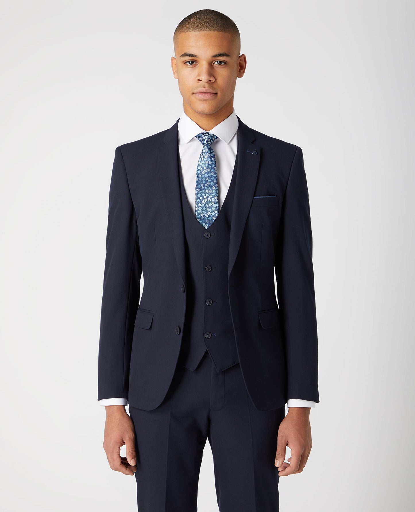 Man wearing a navy X-Slim Fit Stretch Mix and Match Suit