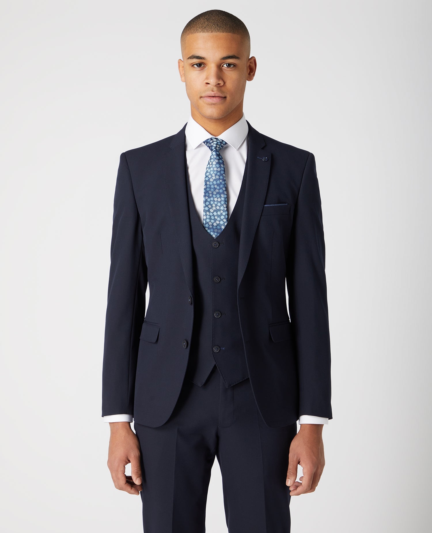 Man wearing a navy X-Slim Fit Stretch Mix and Match Suit
